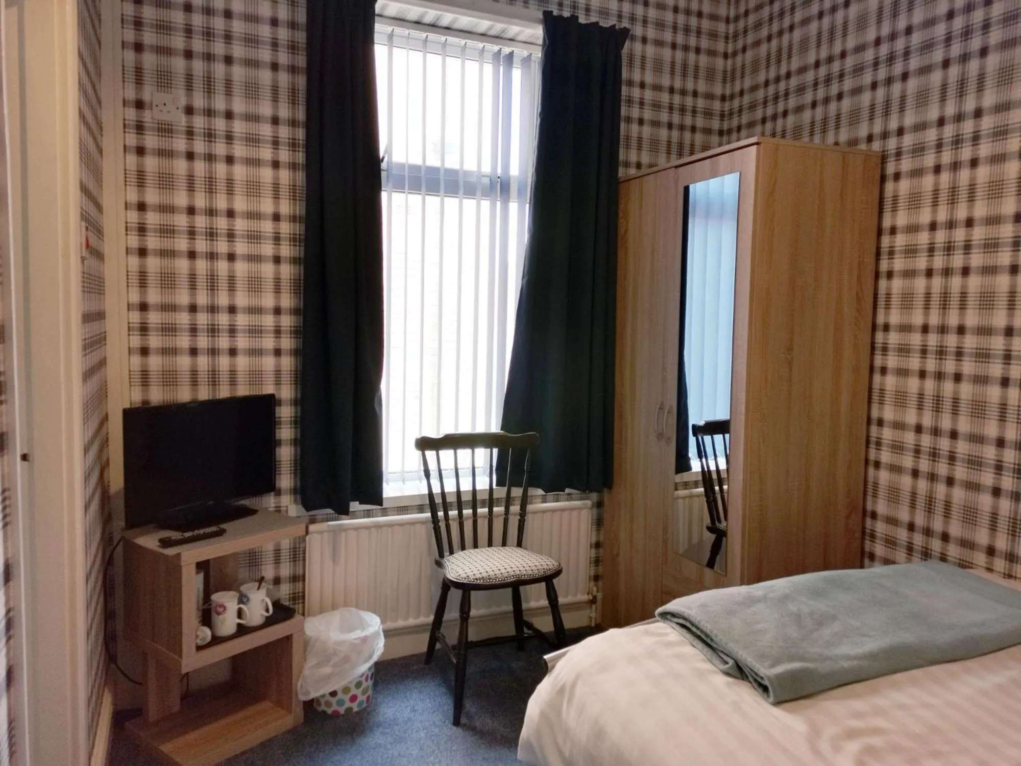 Bedroom in Sherwood Hotel