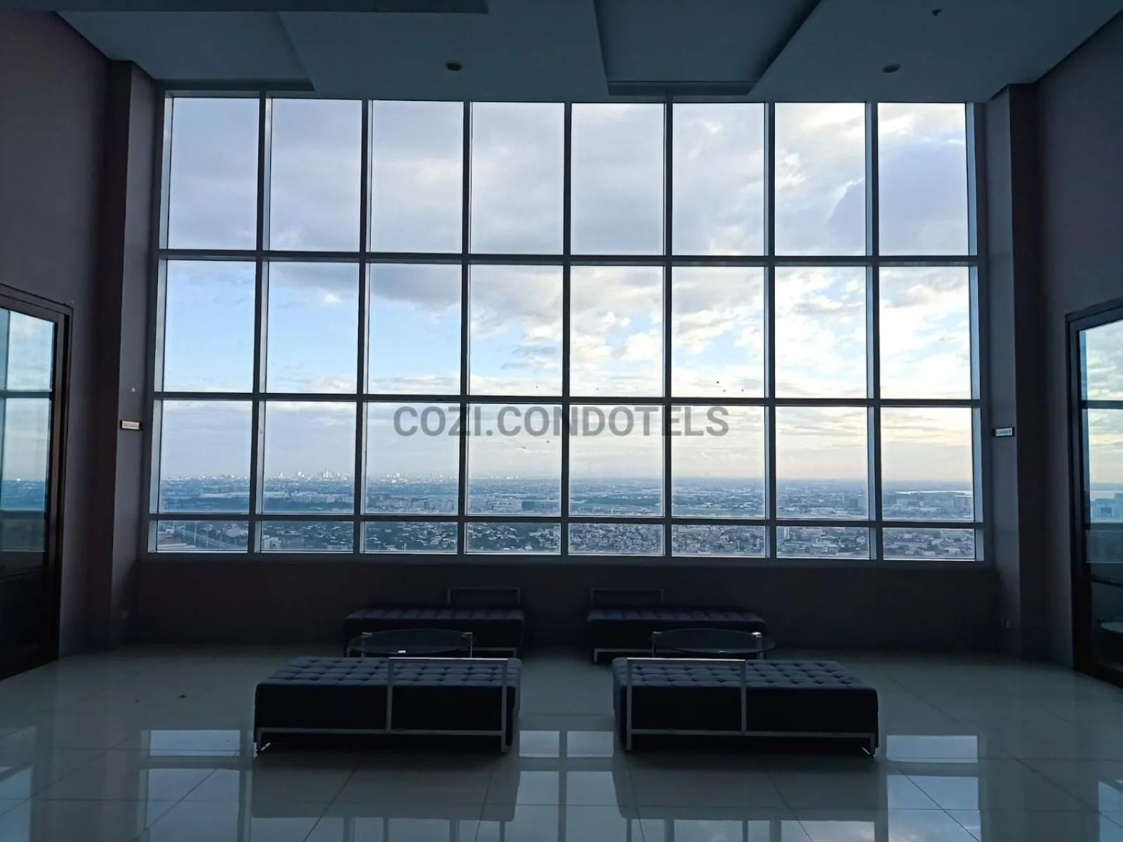 Seating area in The Beacon Makati by Cozi Condotels