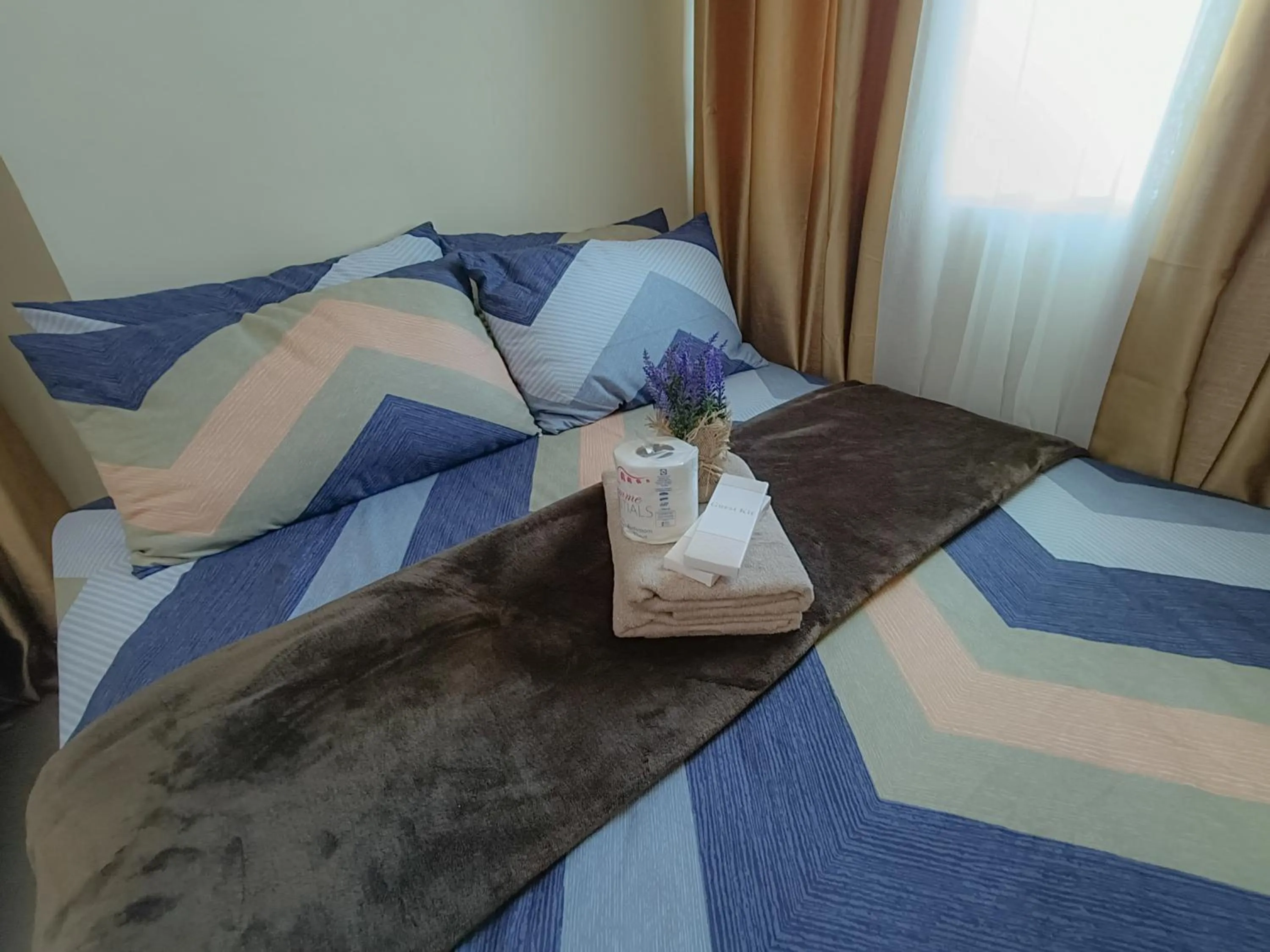 Bed in The Beacon Makati by Cozi Condotels