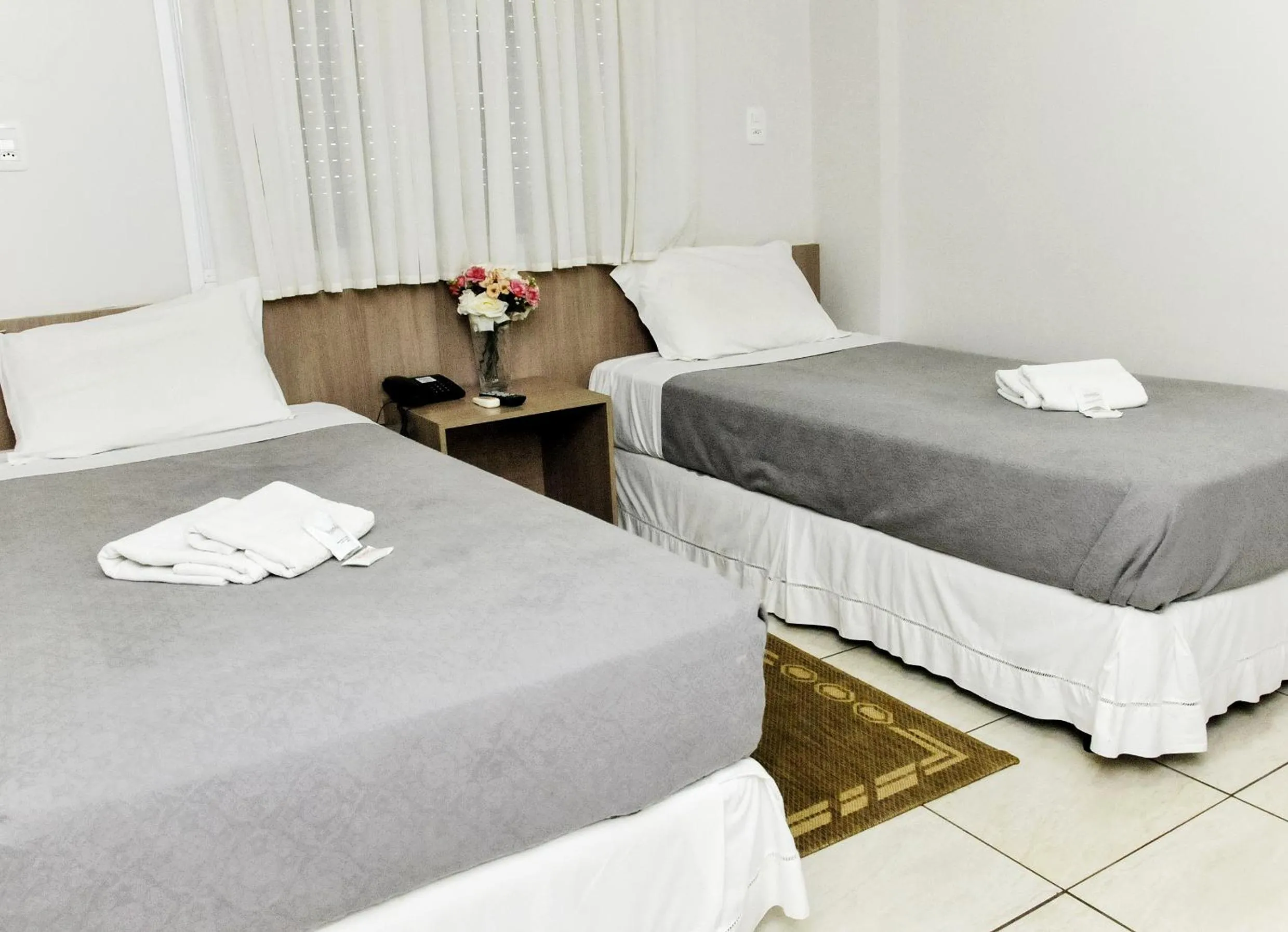 Bed in Vivendas Hotel