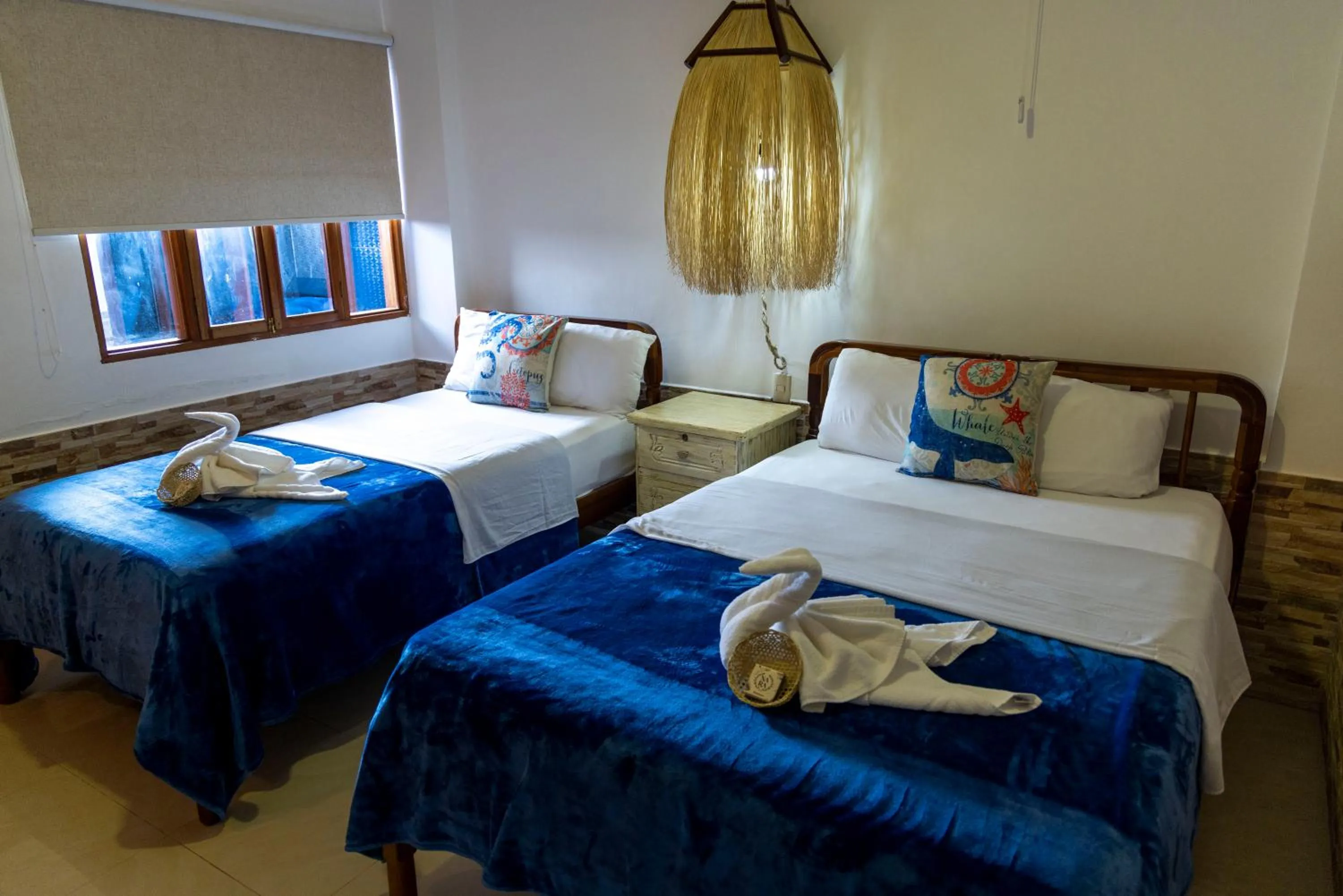Photo of the whole room, Bed in Hotel Galapagos Planet