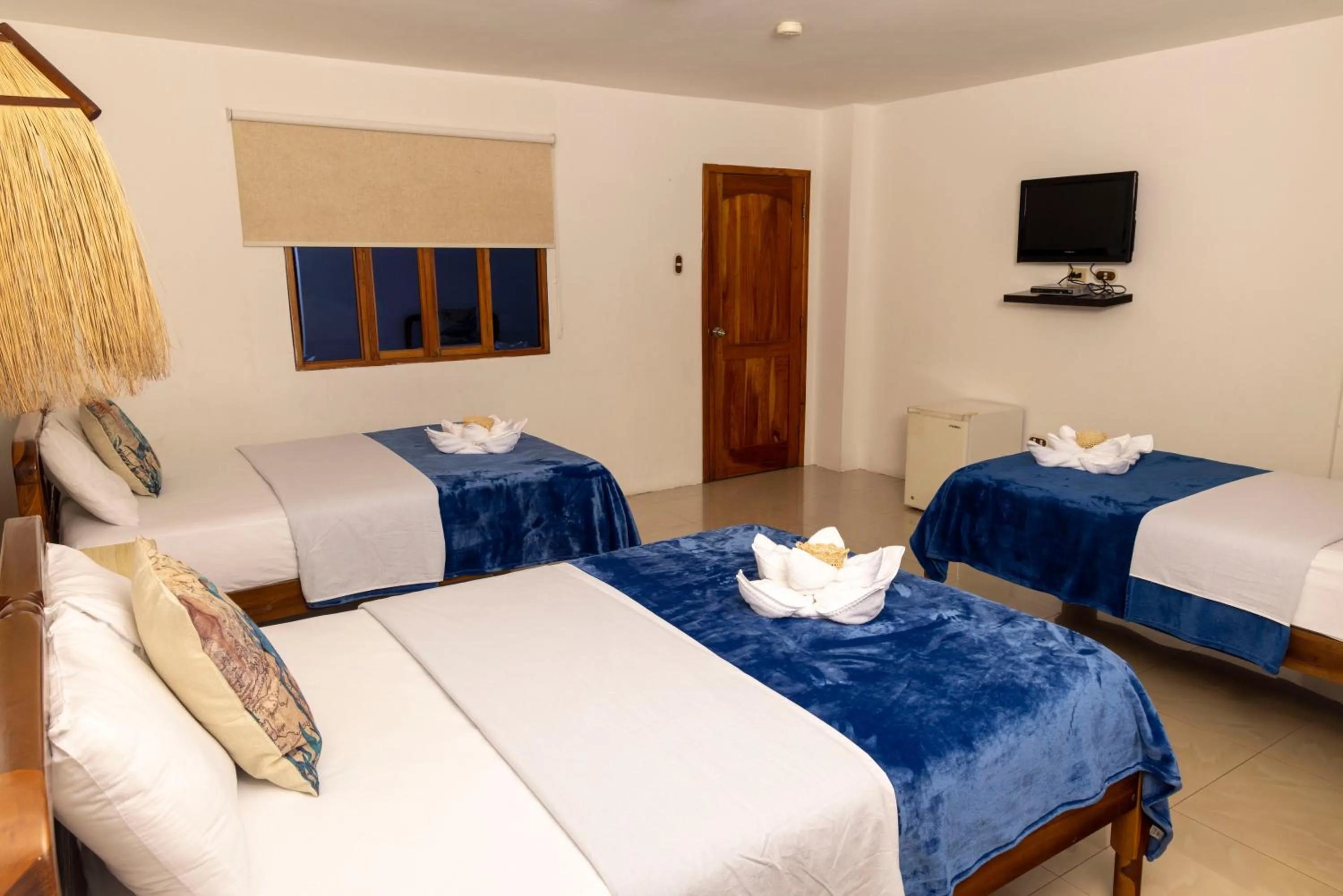 Photo of the whole room, Bed in Hotel Galapagos Planet