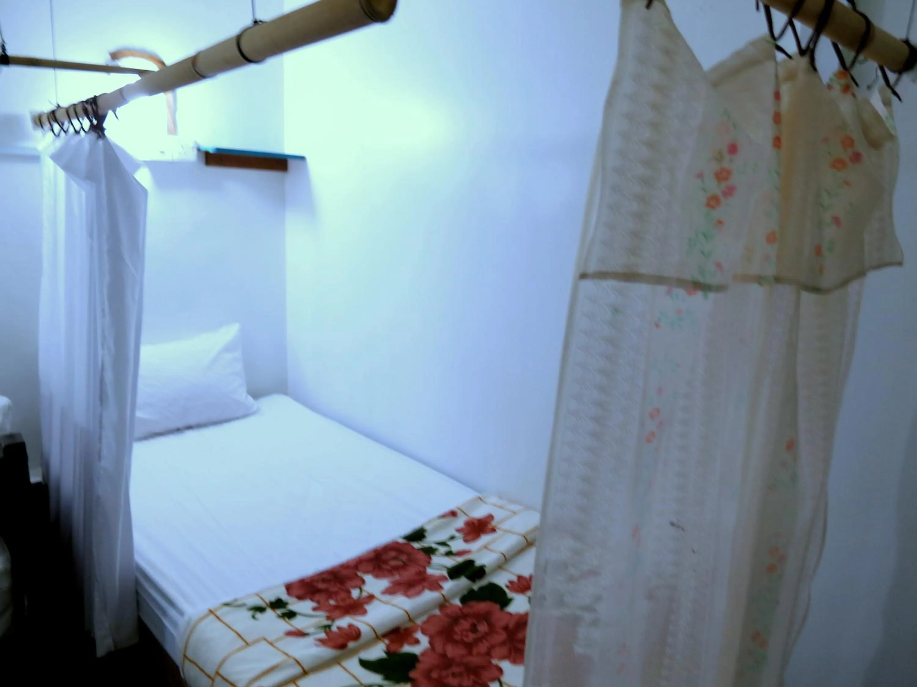 Bed in Pangkor Guesthouse SPK