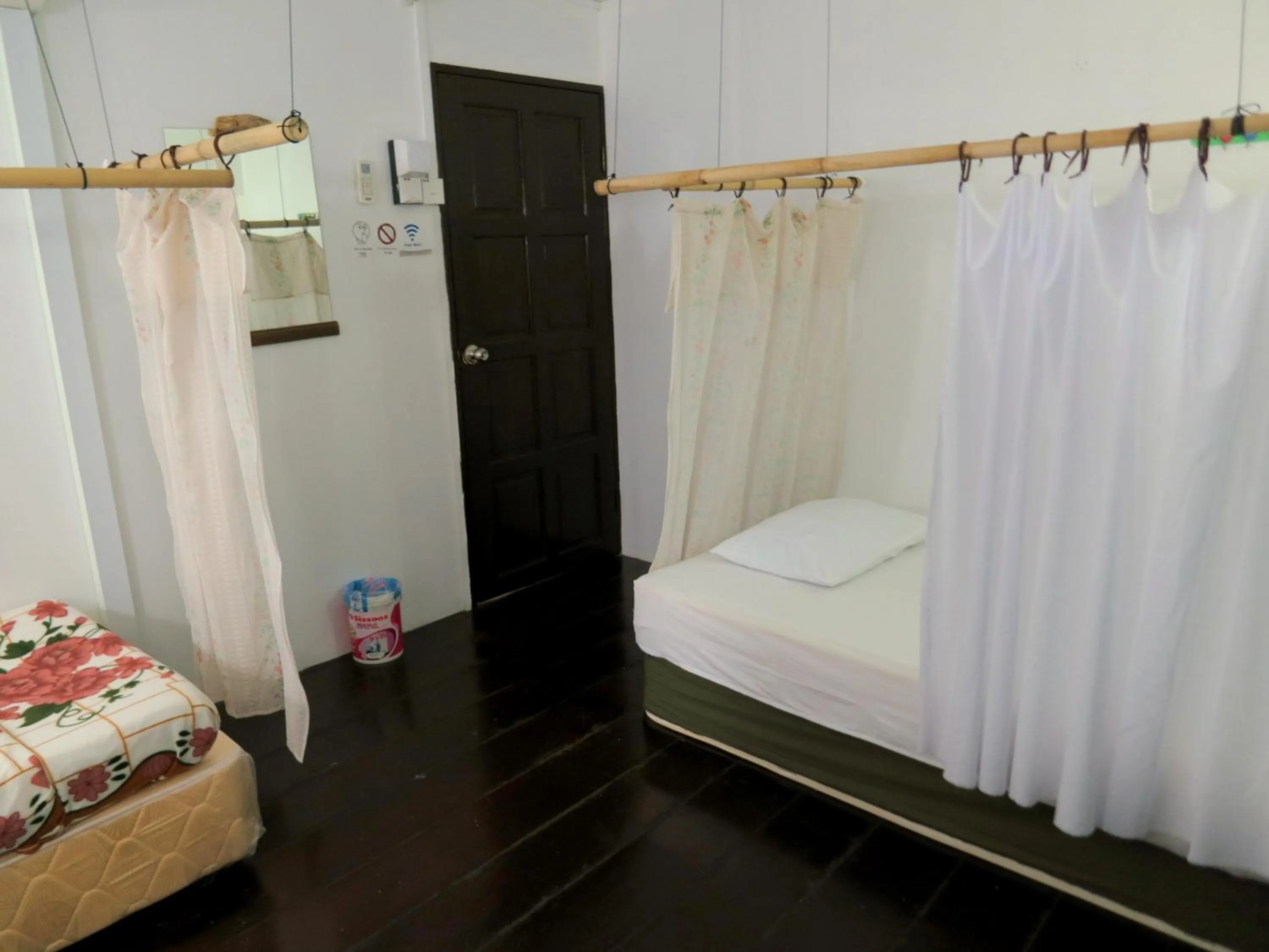 Bed in Pangkor Guesthouse SPK