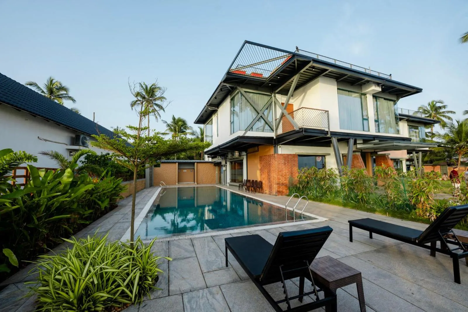 Swimming pool in ANANSA BOUTIQUE HOTEL by The Kannur Club