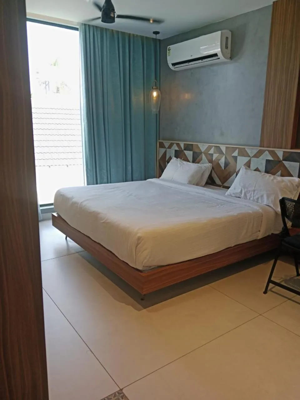 Bed in ANANSA BOUTIQUE HOTEL by The Kannur Club