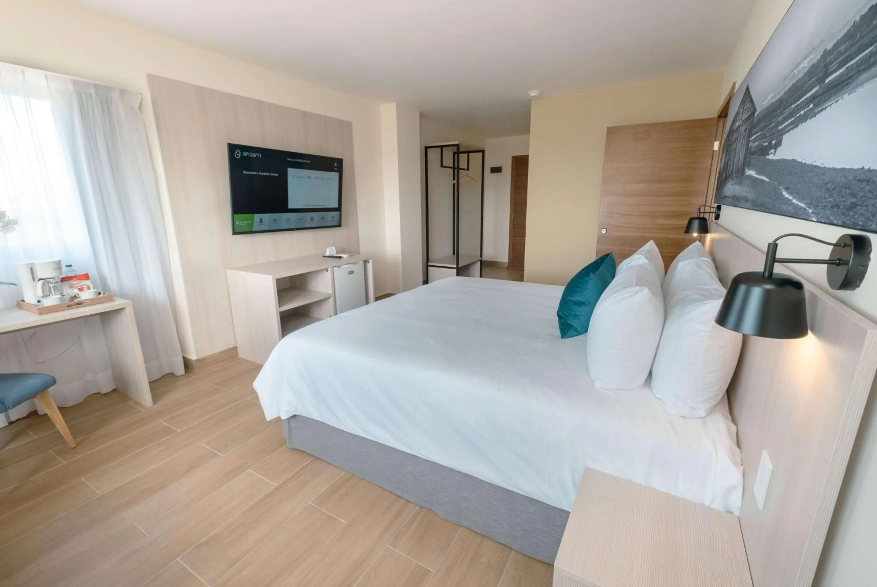 Photo of the whole room, Bed in Wyndham Garden El Morro Montecristi