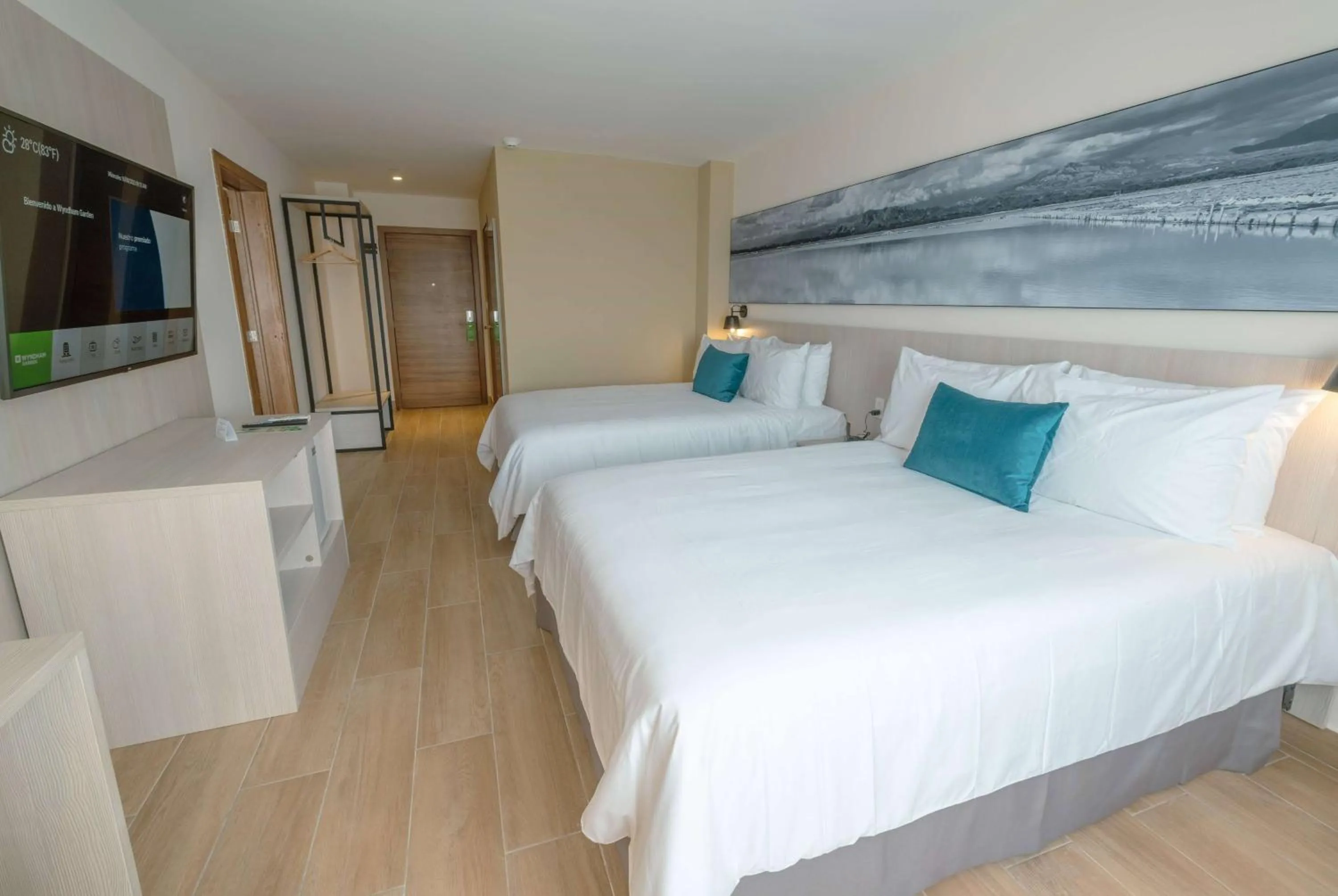 Photo of the whole room, Bed in Wyndham Garden El Morro Montecristi