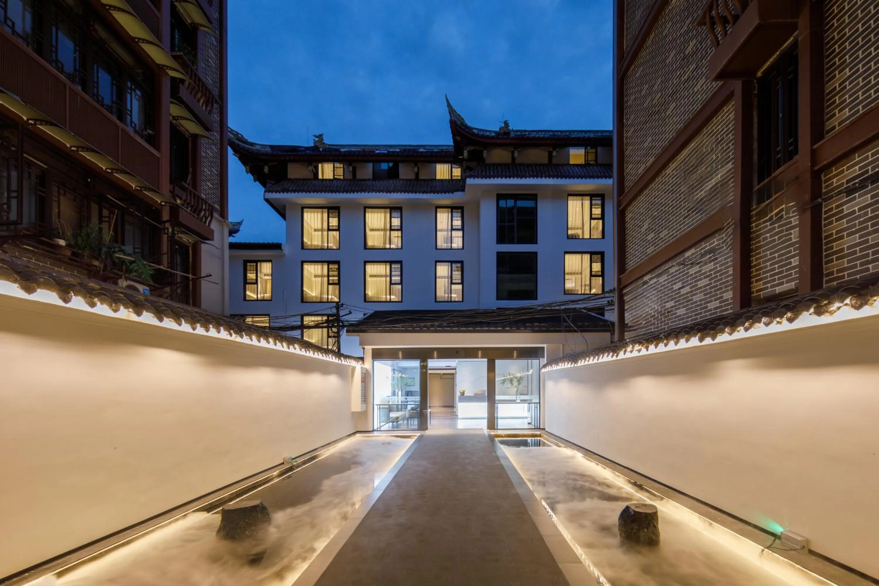 Property building in Gongxili - Xige Hotel Free Welcome Tea and Dessert