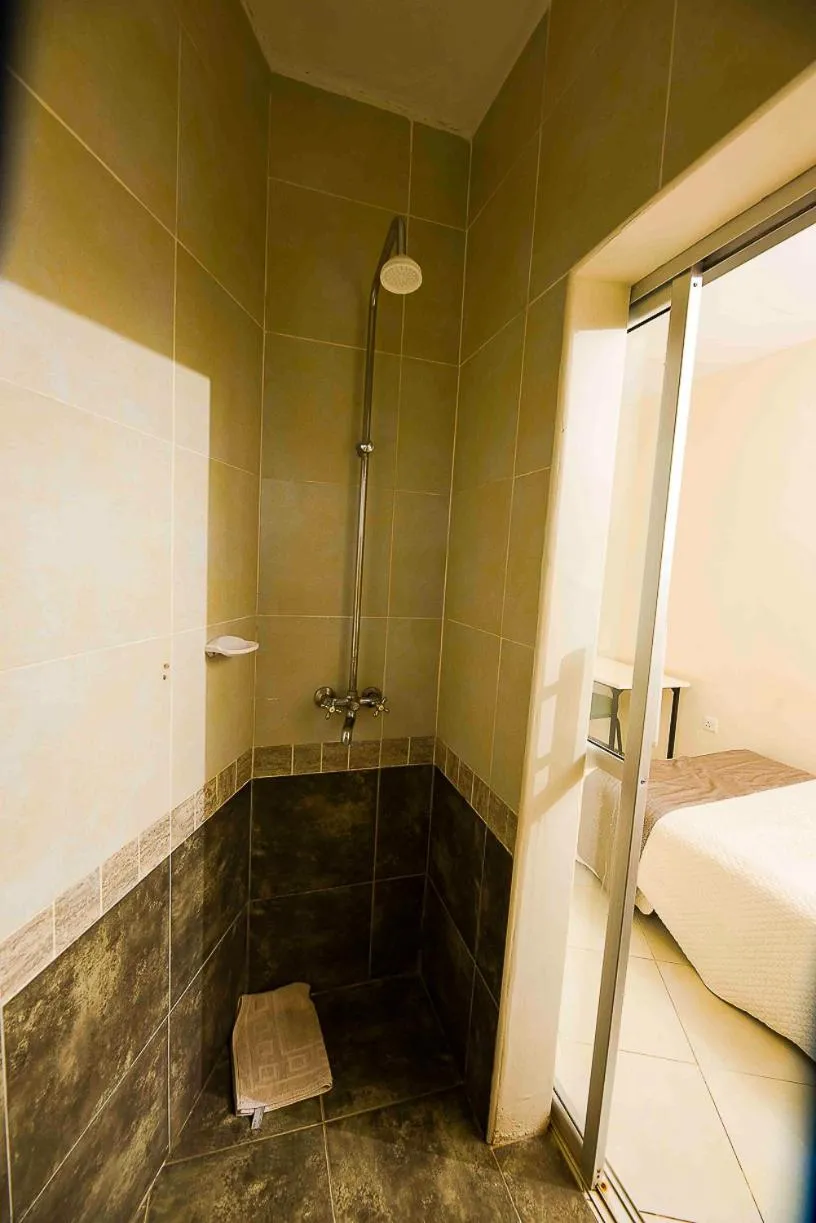 Shower in Acacia Resort Wote-Makueni by Nest & Nomad