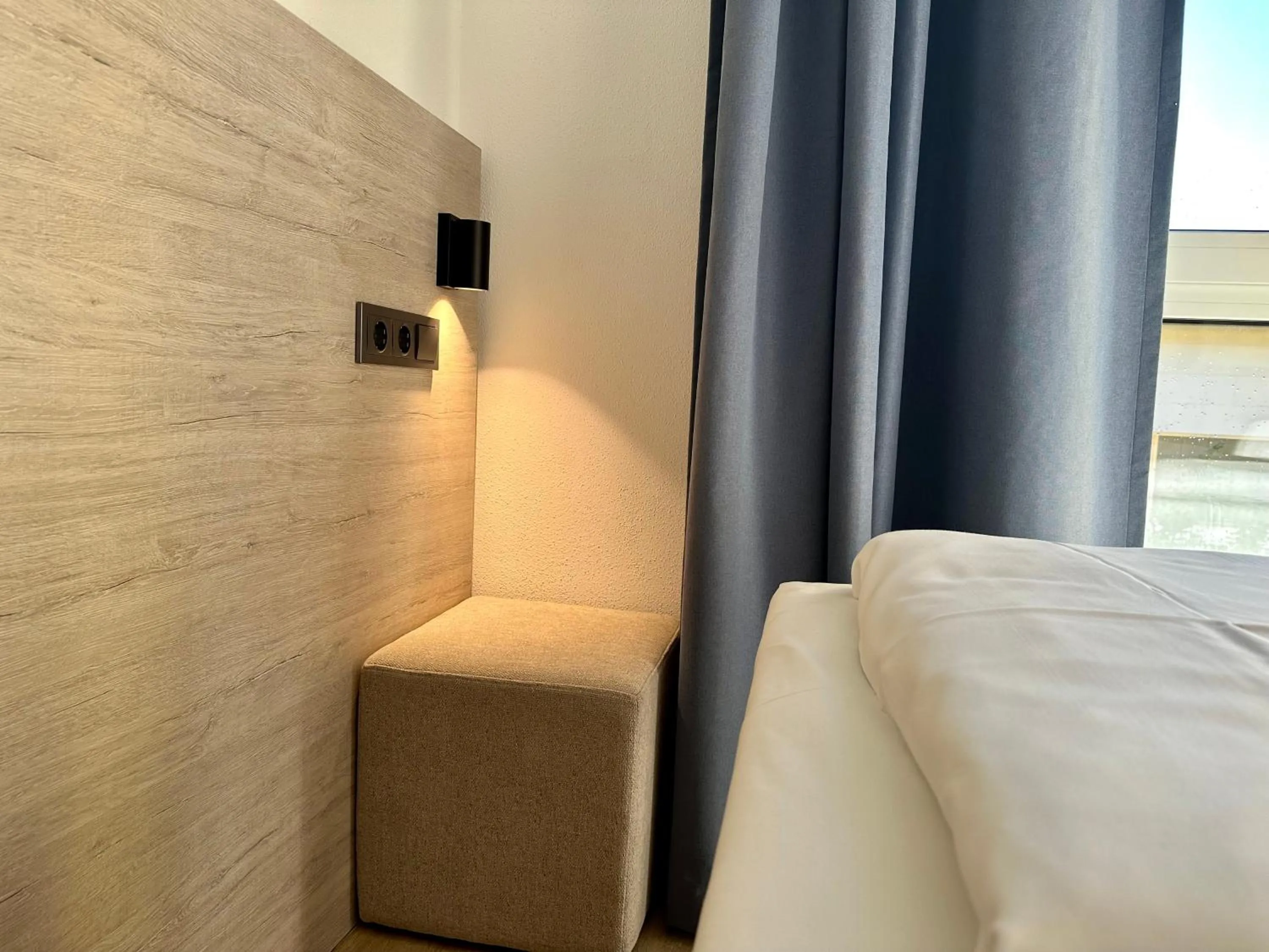 Seating area, Bed in Apartimo München-Unterhaching