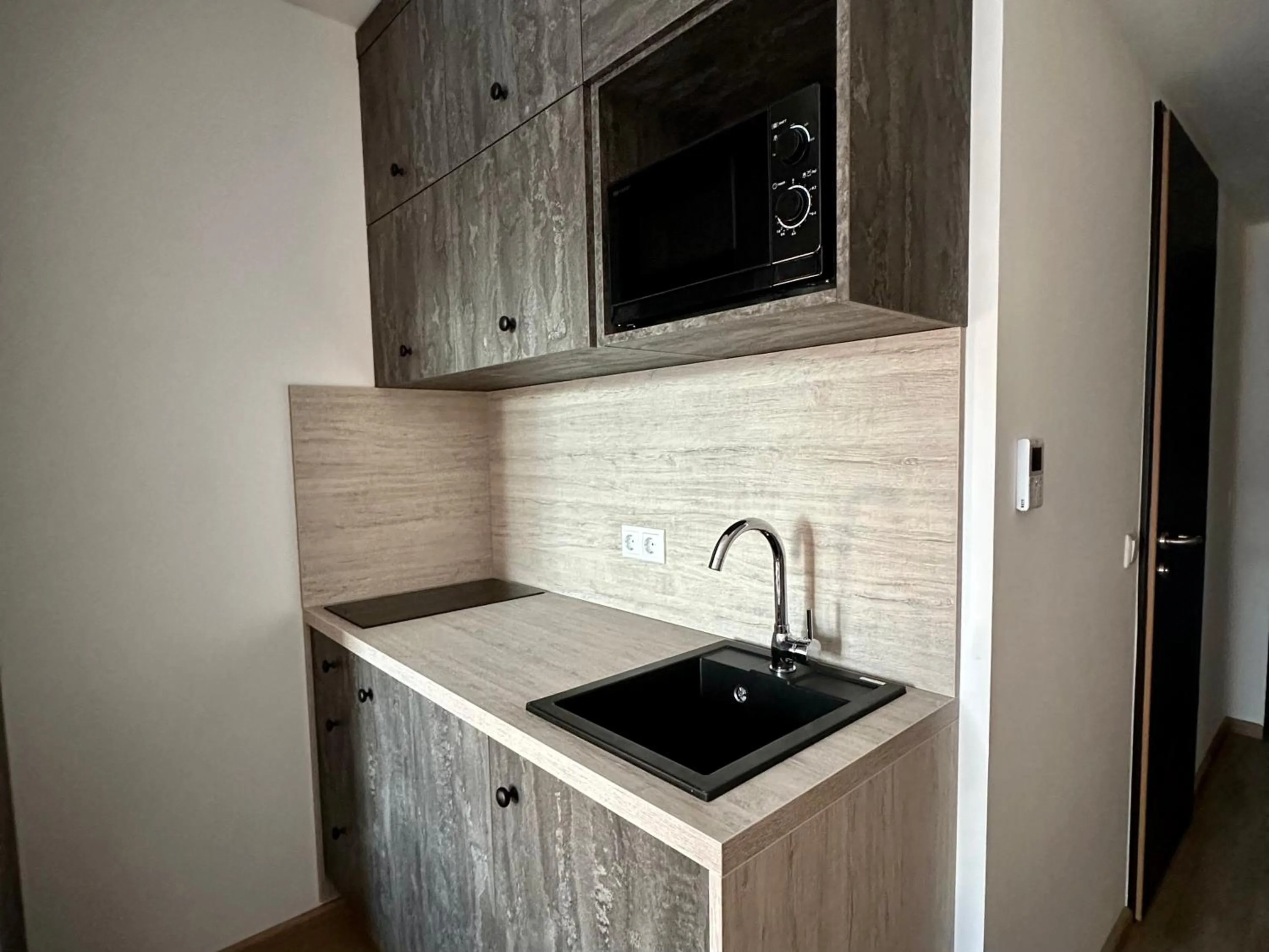 Kitchen or kitchenette in Apartimo München-Unterhaching