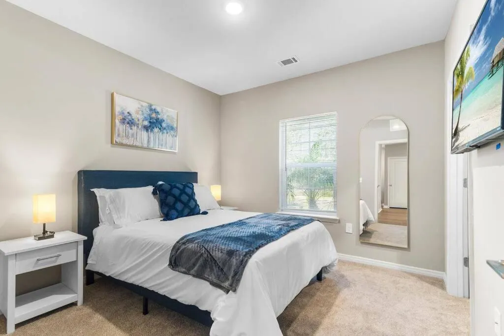 Bed in Luxury Living: 1BR Condo w/ Resort-Style Amenities
