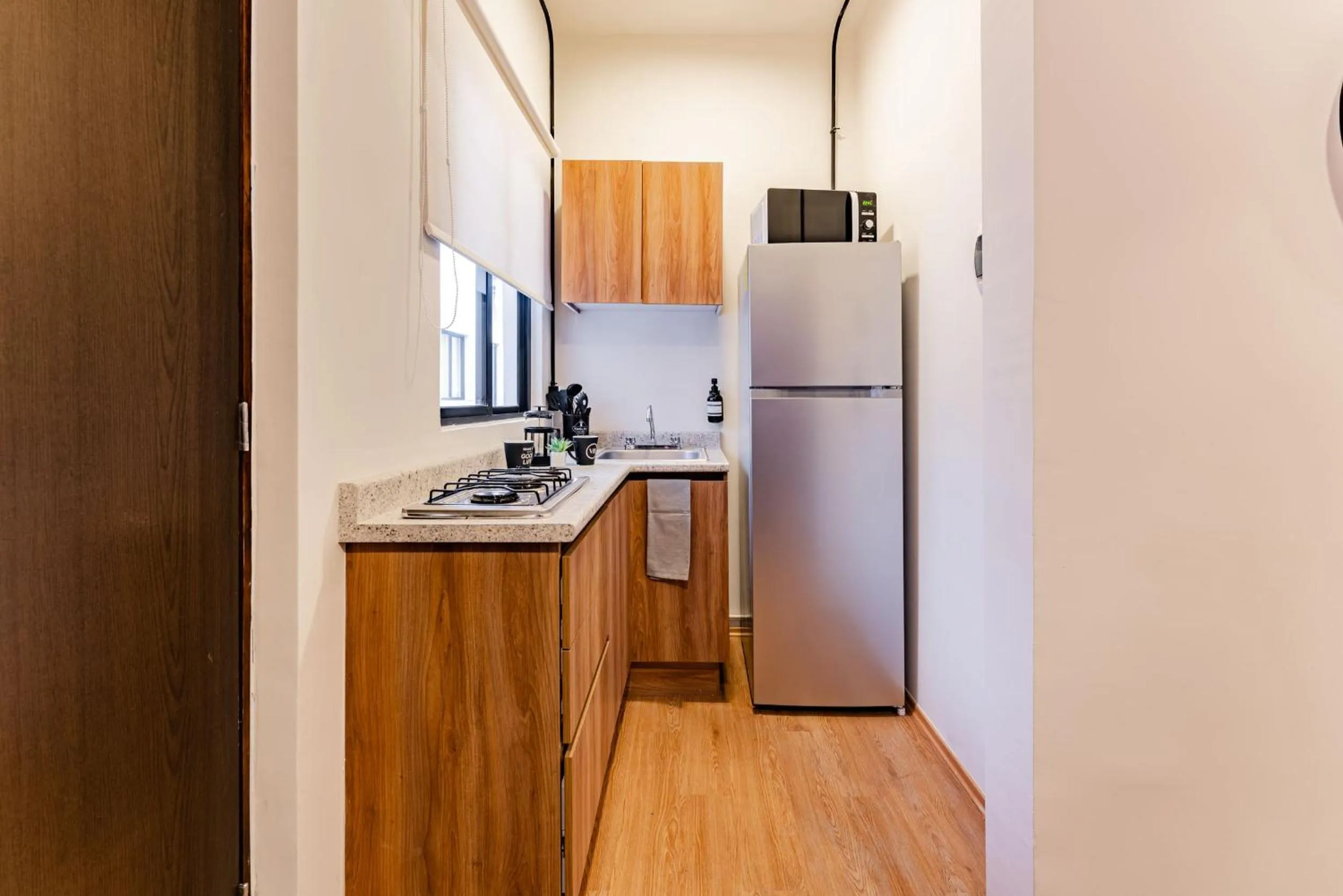 Kitchen or kitchenette in Mariano Escobedo Apartments by VH