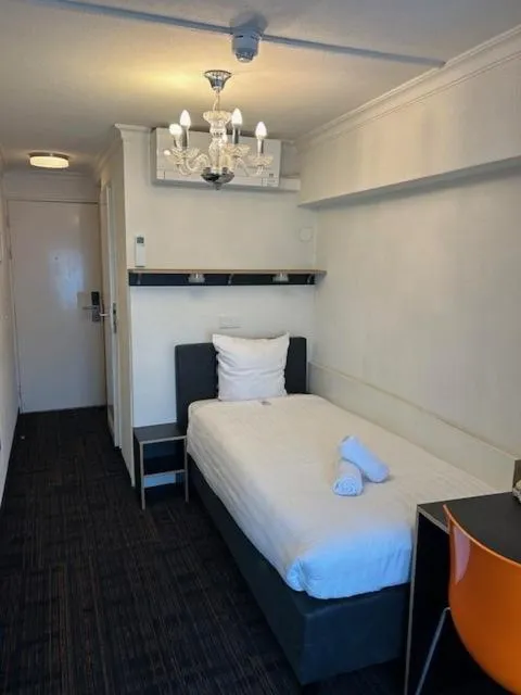 Bed in Multatuli Hotel