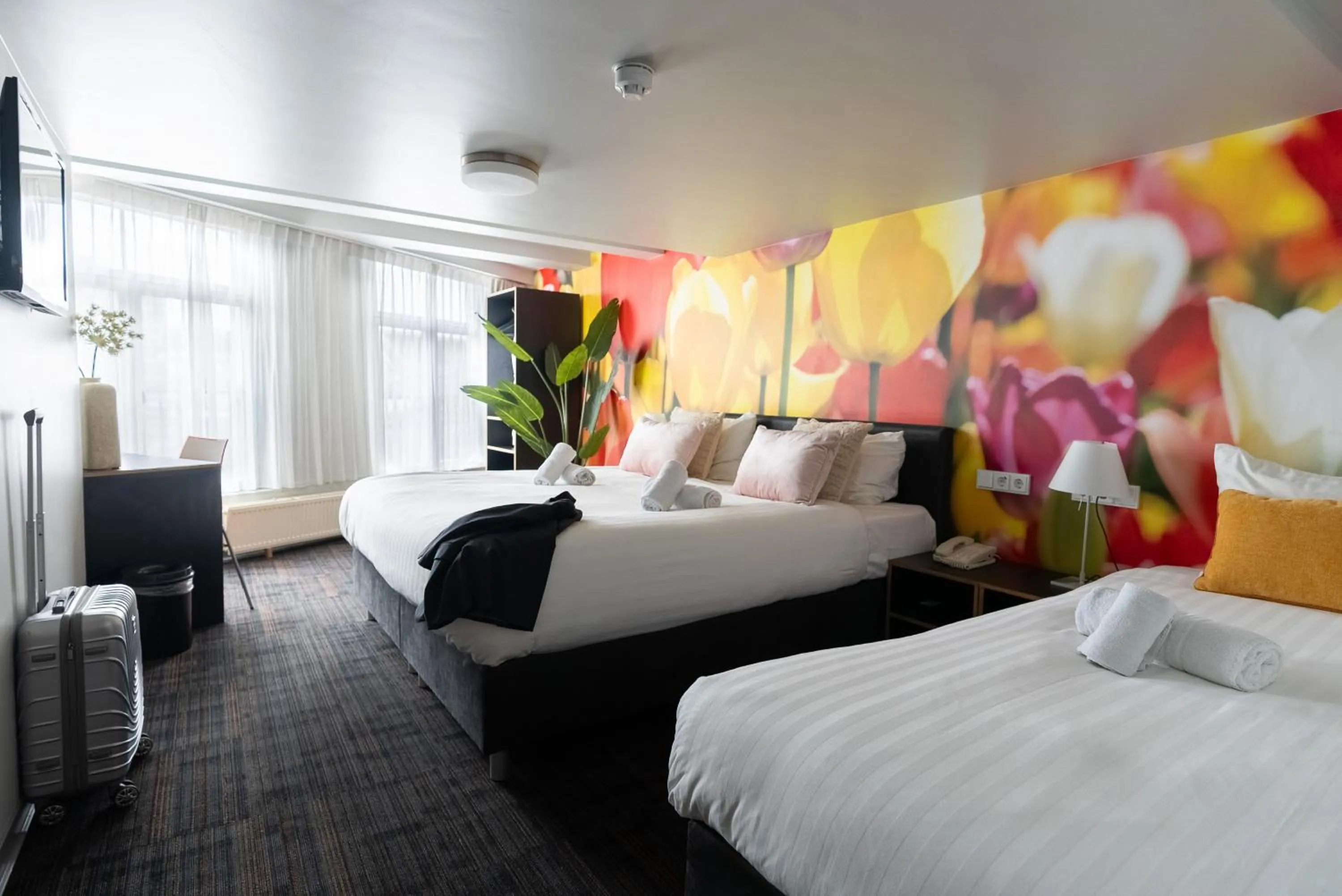 Bed in Multatuli Hotel