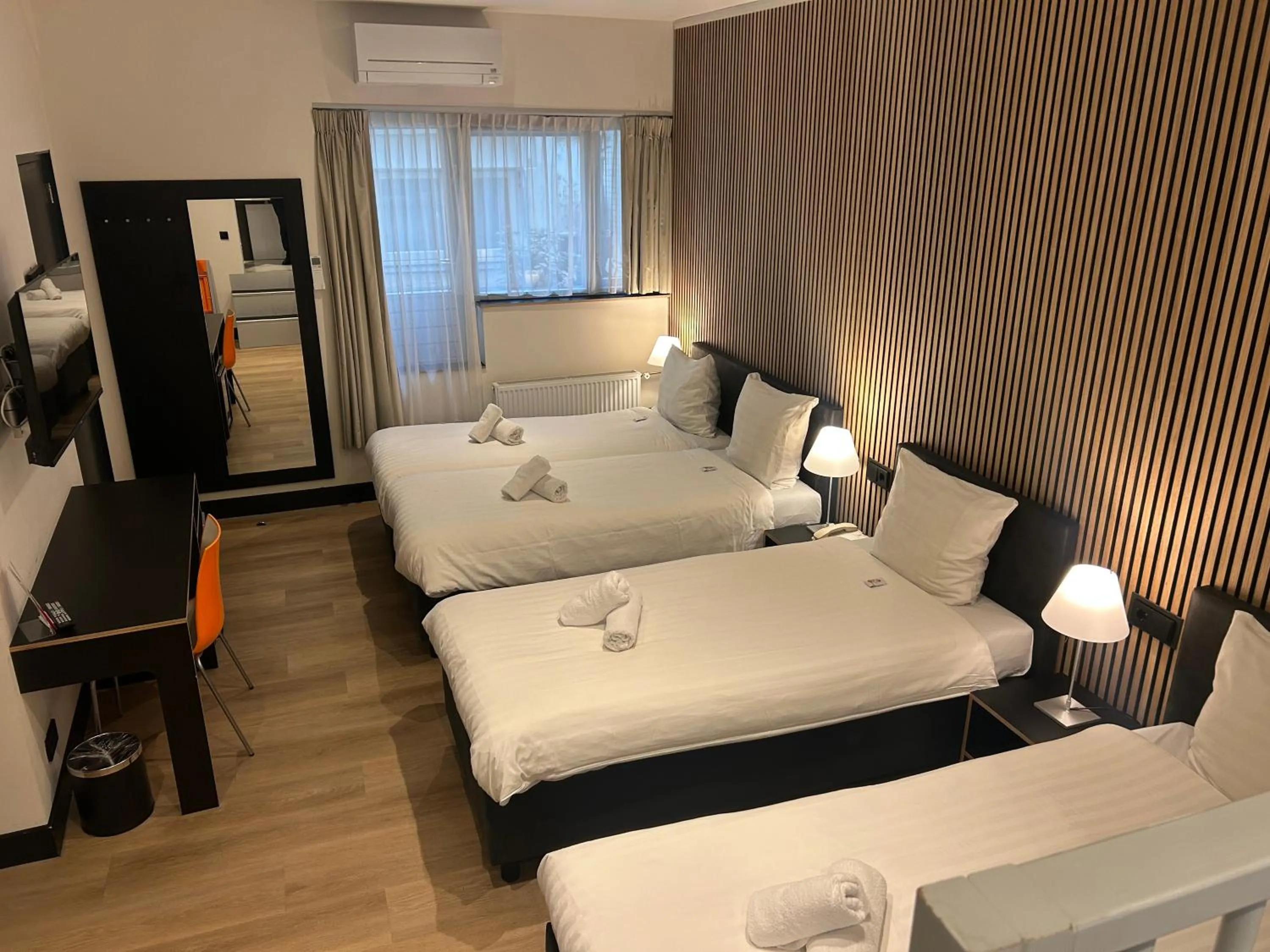 Bed in Multatuli Hotel