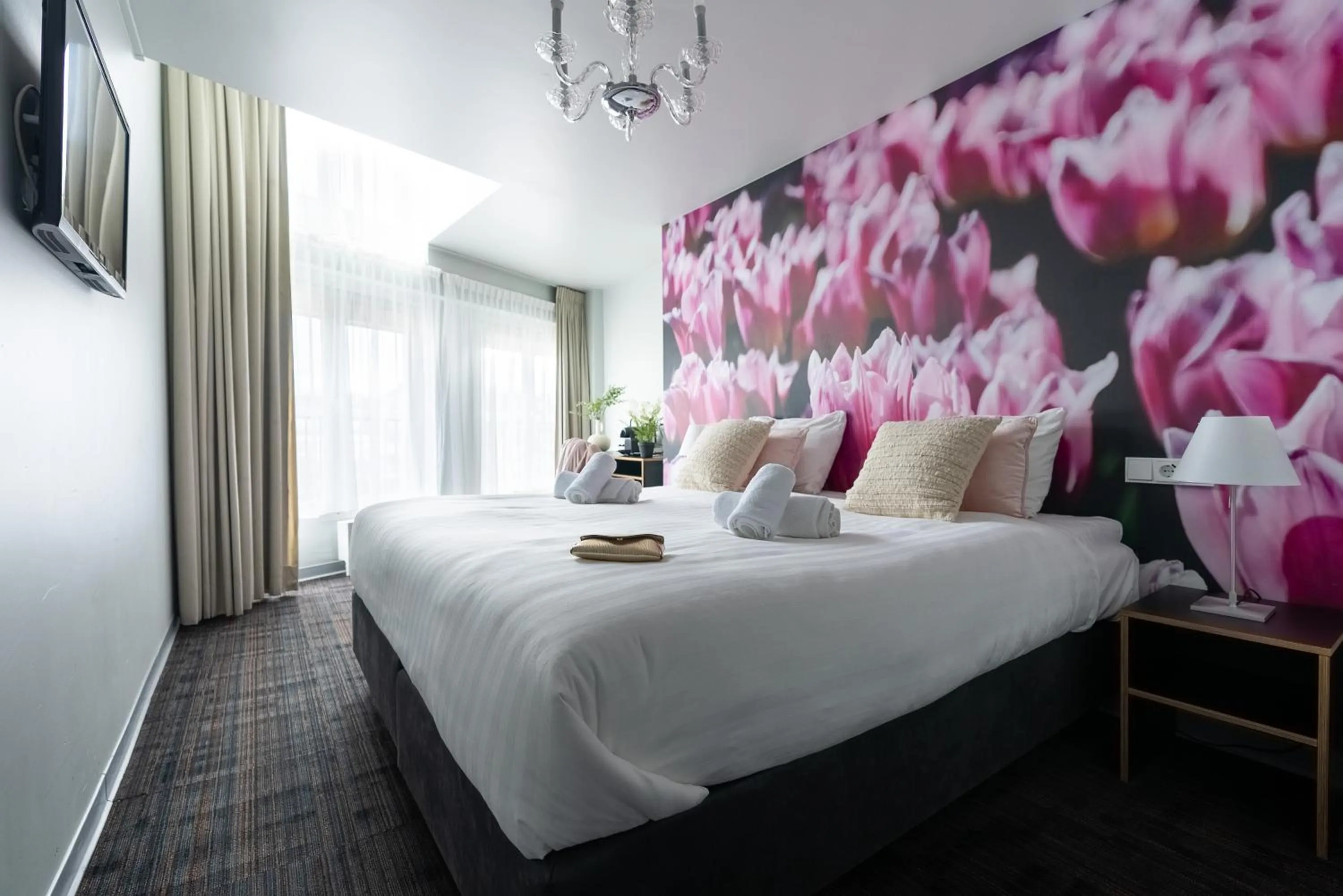 Bed in Multatuli Hotel