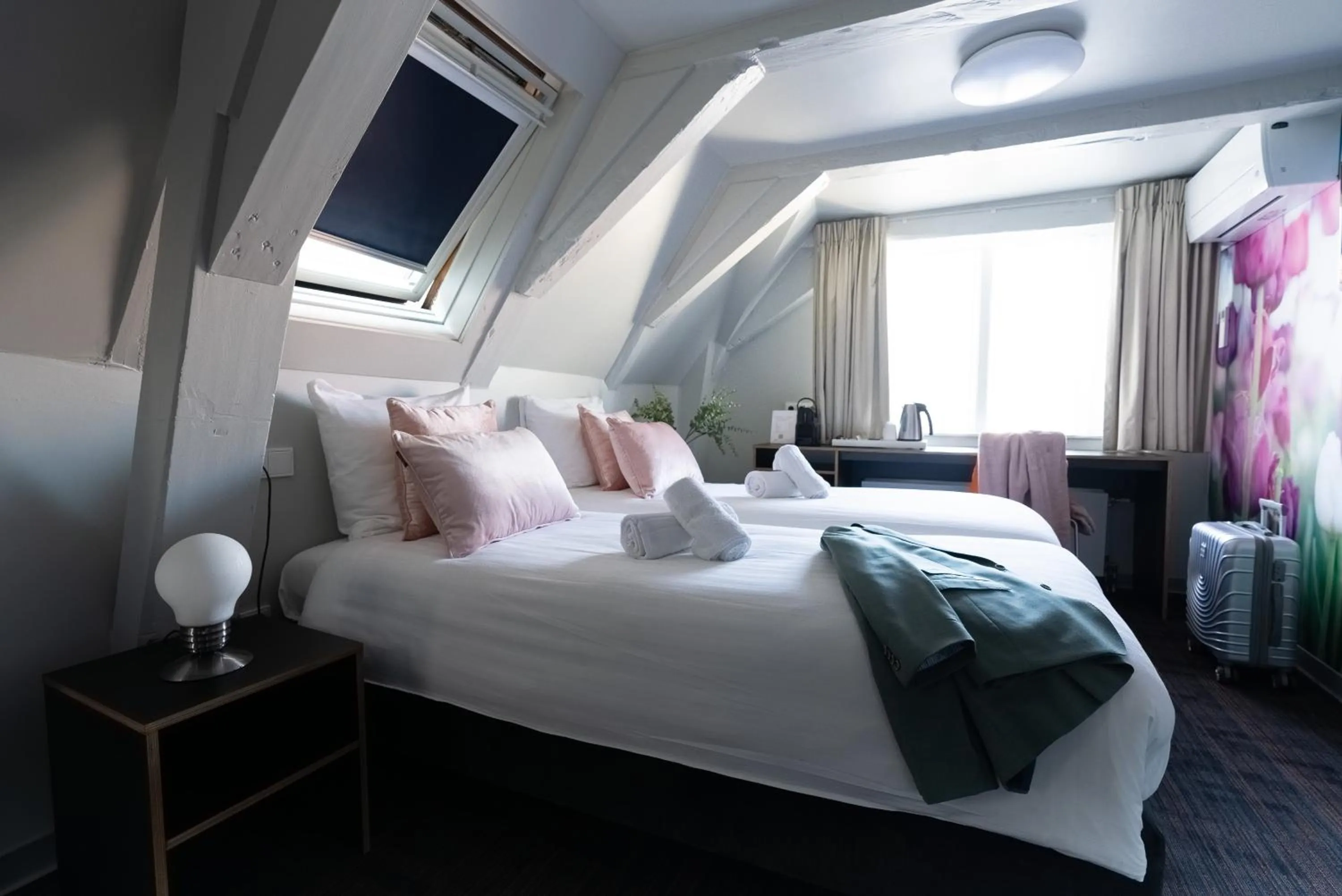 Bed in Multatuli Hotel