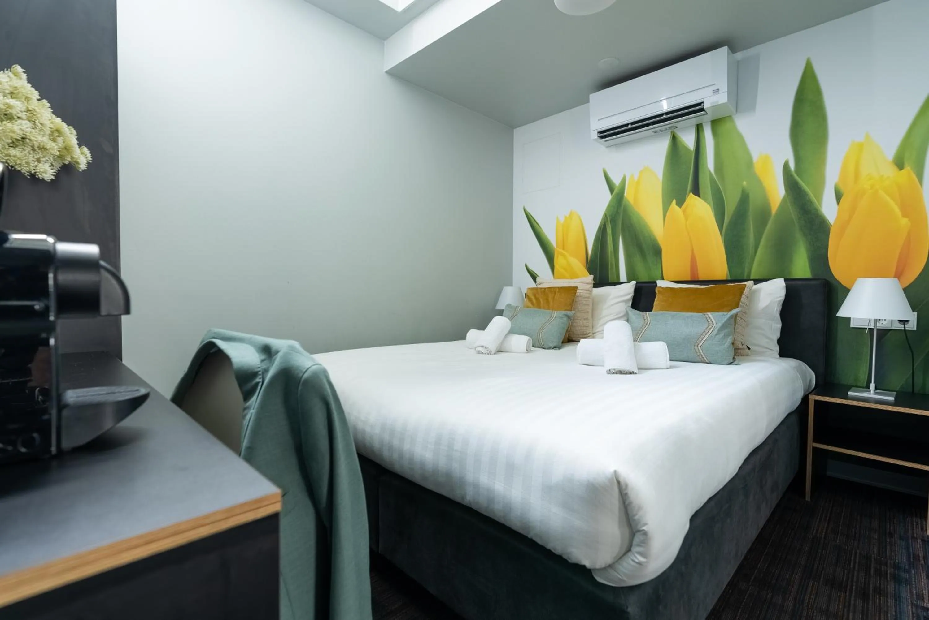 Bed in Multatuli Hotel