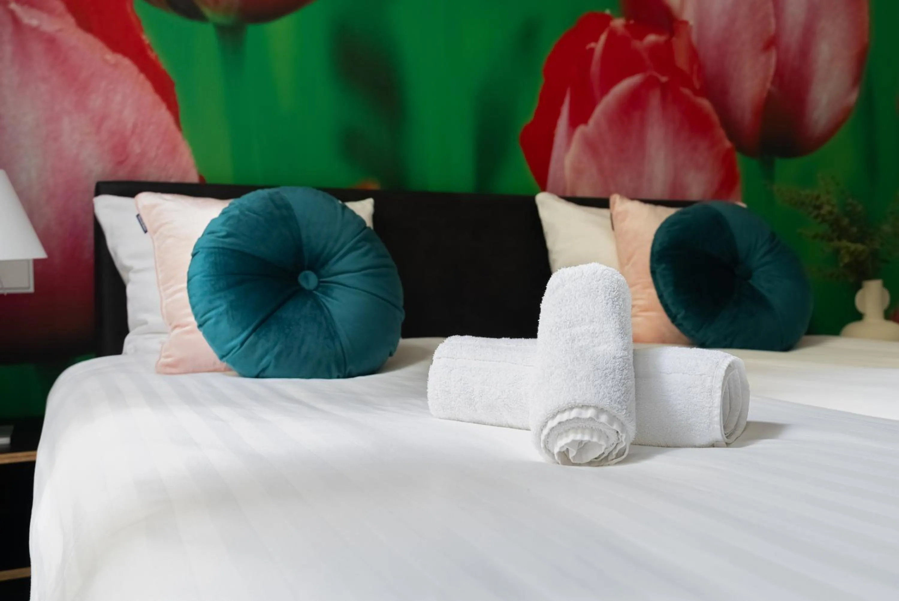 Bed in Multatuli Hotel