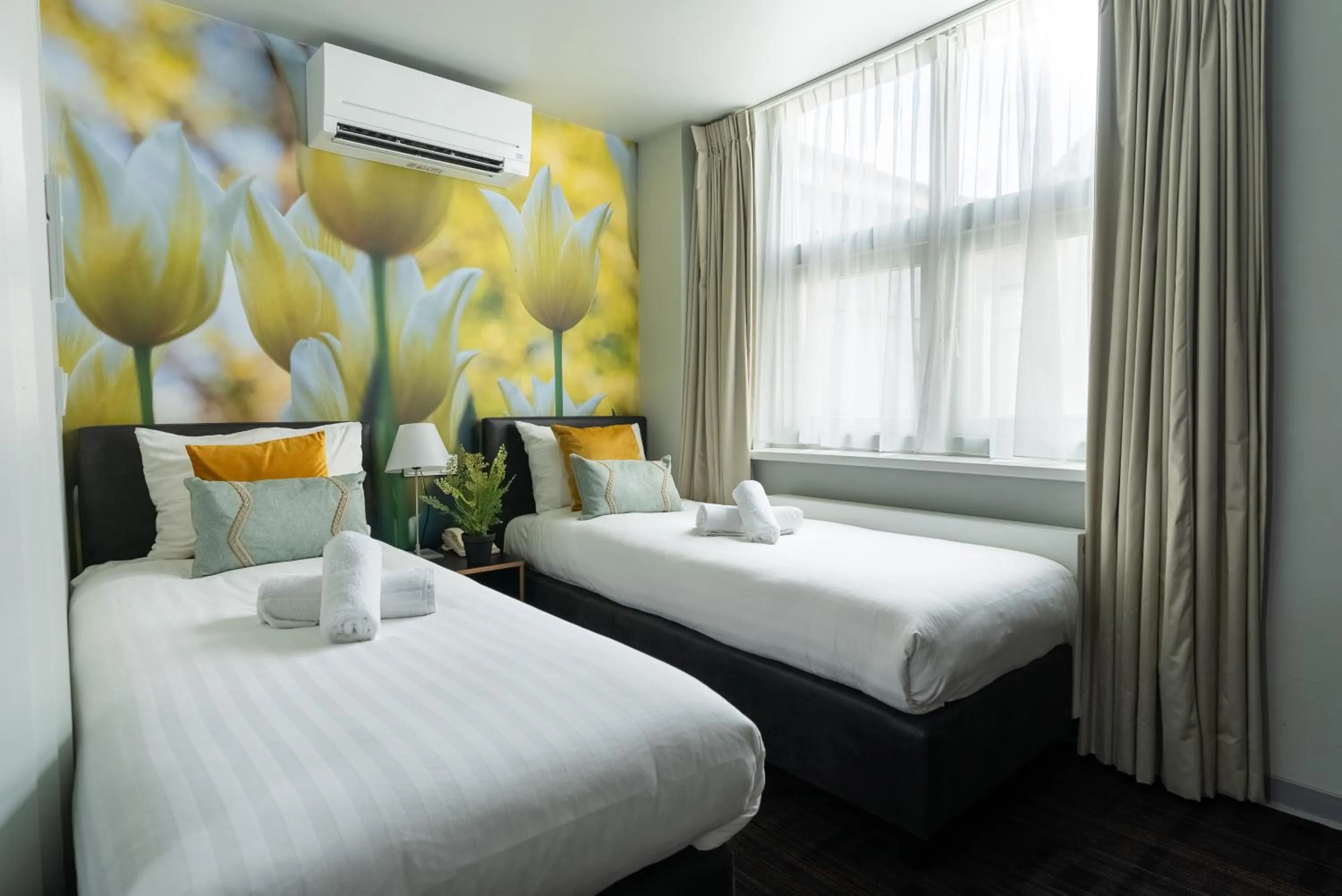 Bed in Multatuli Hotel