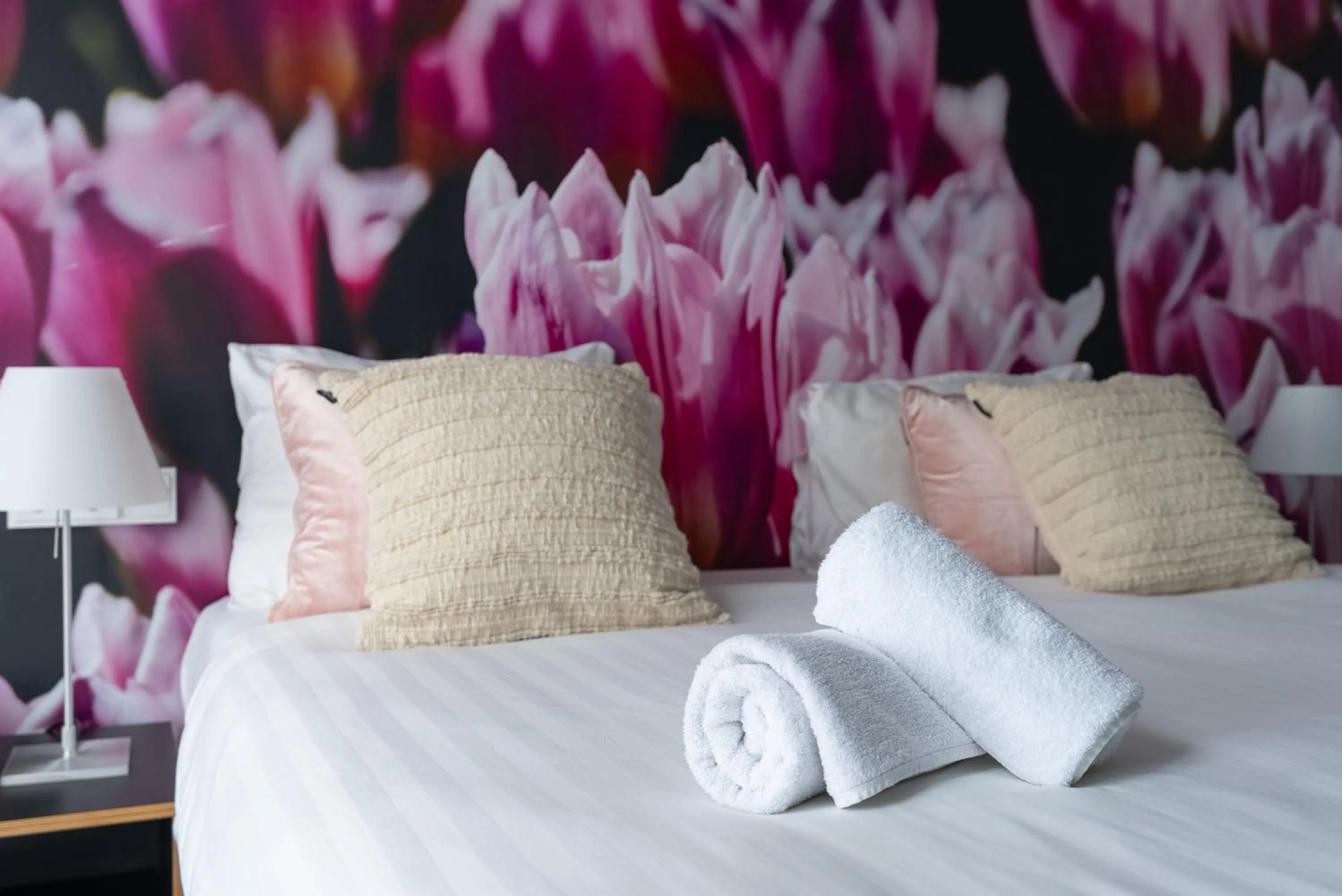 Bed in Multatuli Hotel