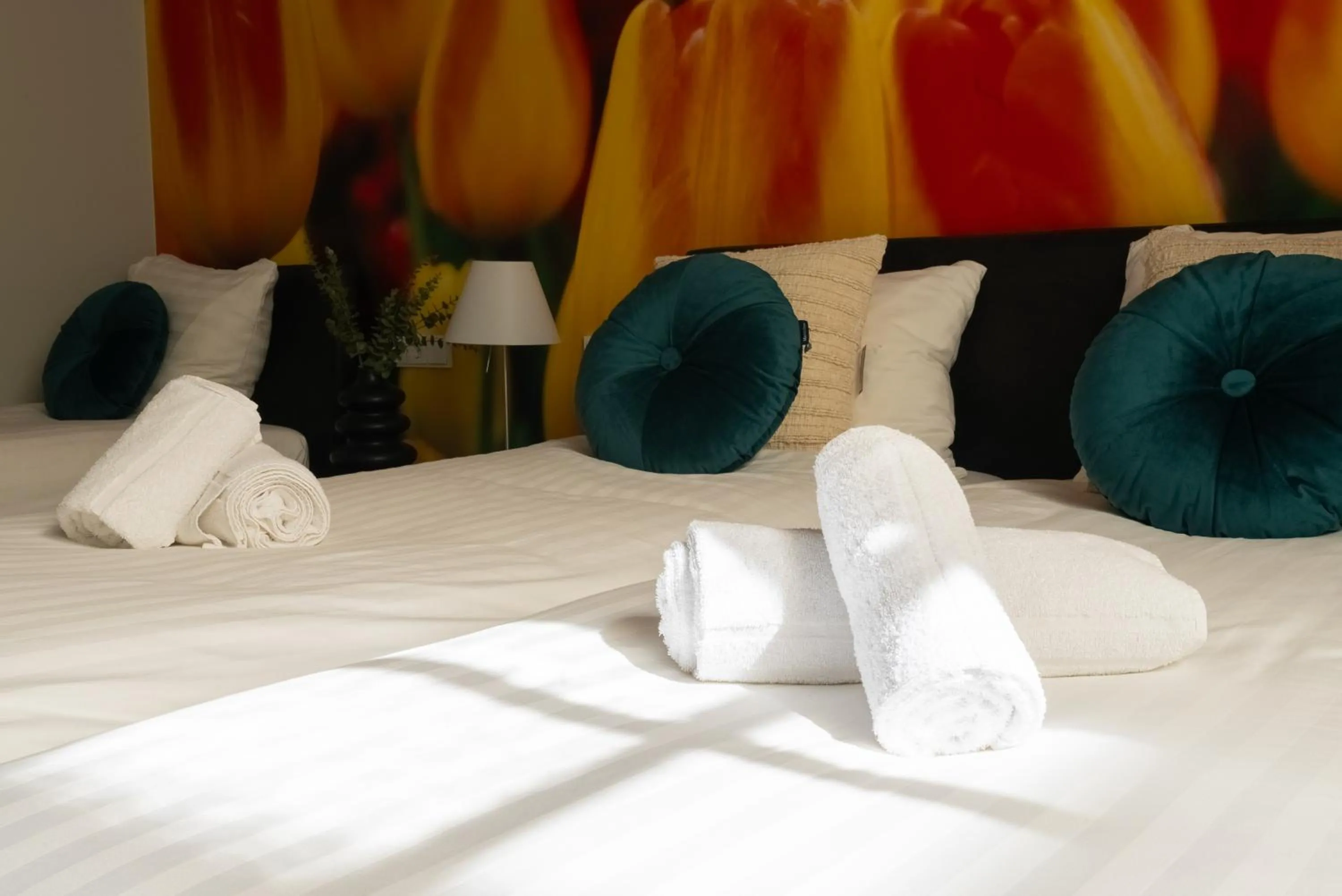 Bed in Multatuli Hotel