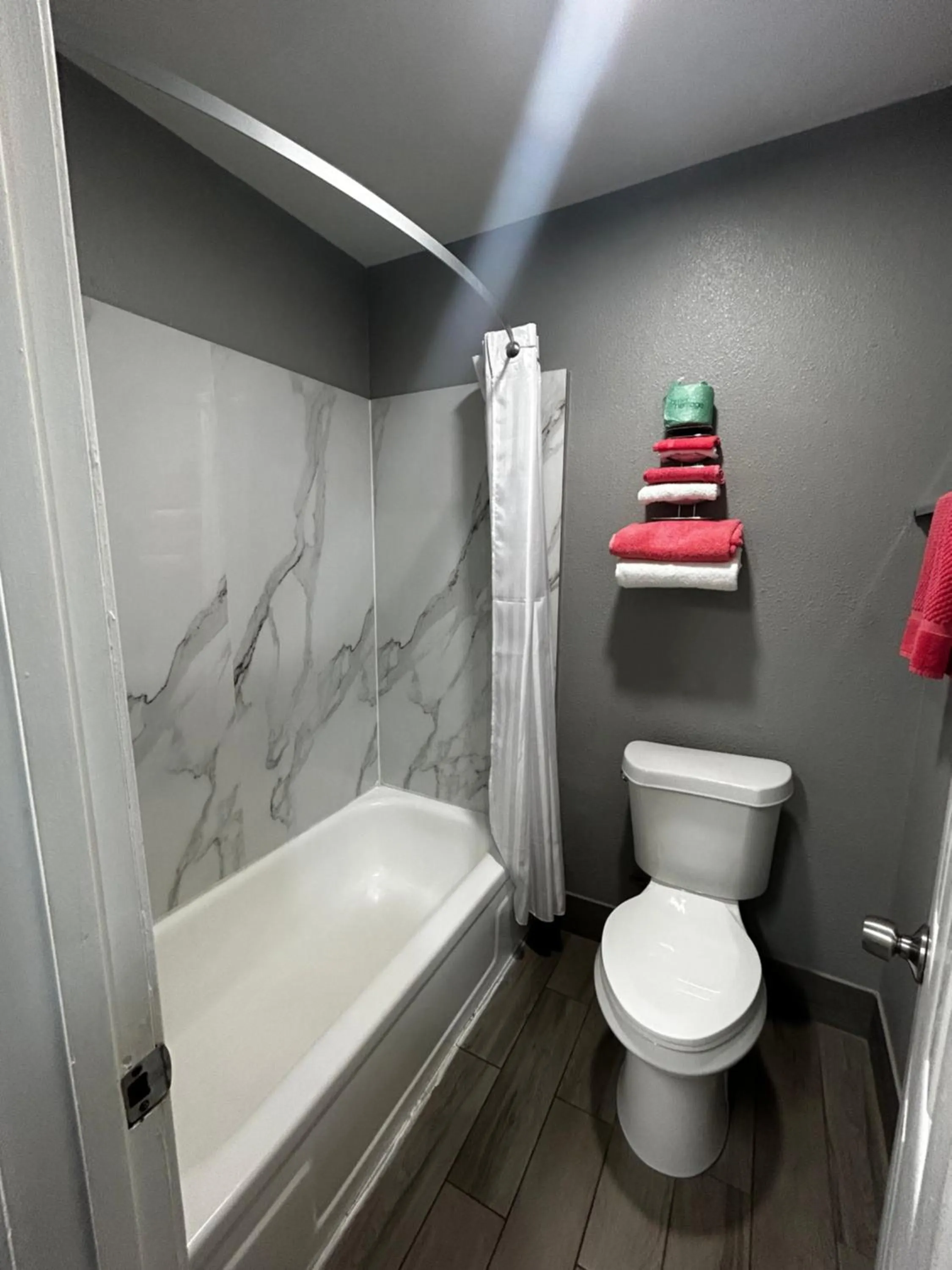 Toilet in Coachman's Inn & Suites