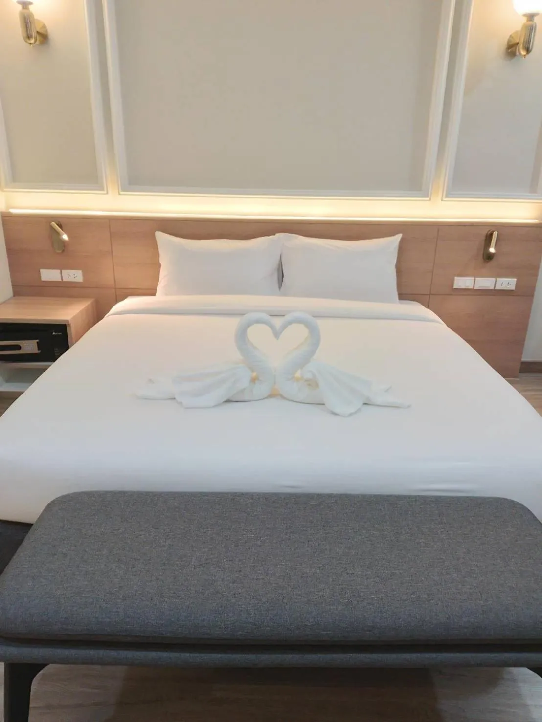 Bed in Mayflower Grande Suite Hotel