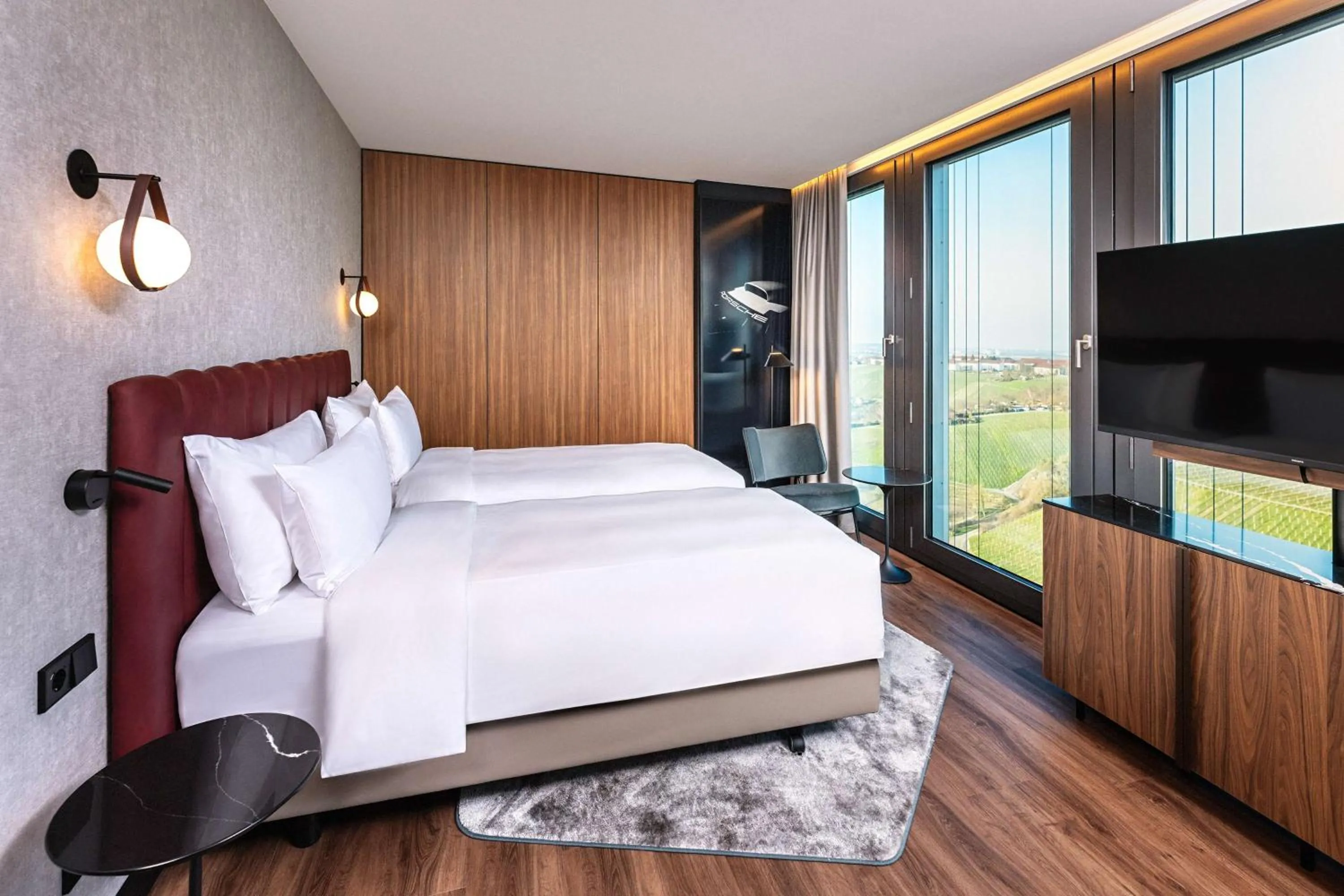 Bedroom, Bed in Radisson Blu Hotel at Porsche Design Tower Stuttgart