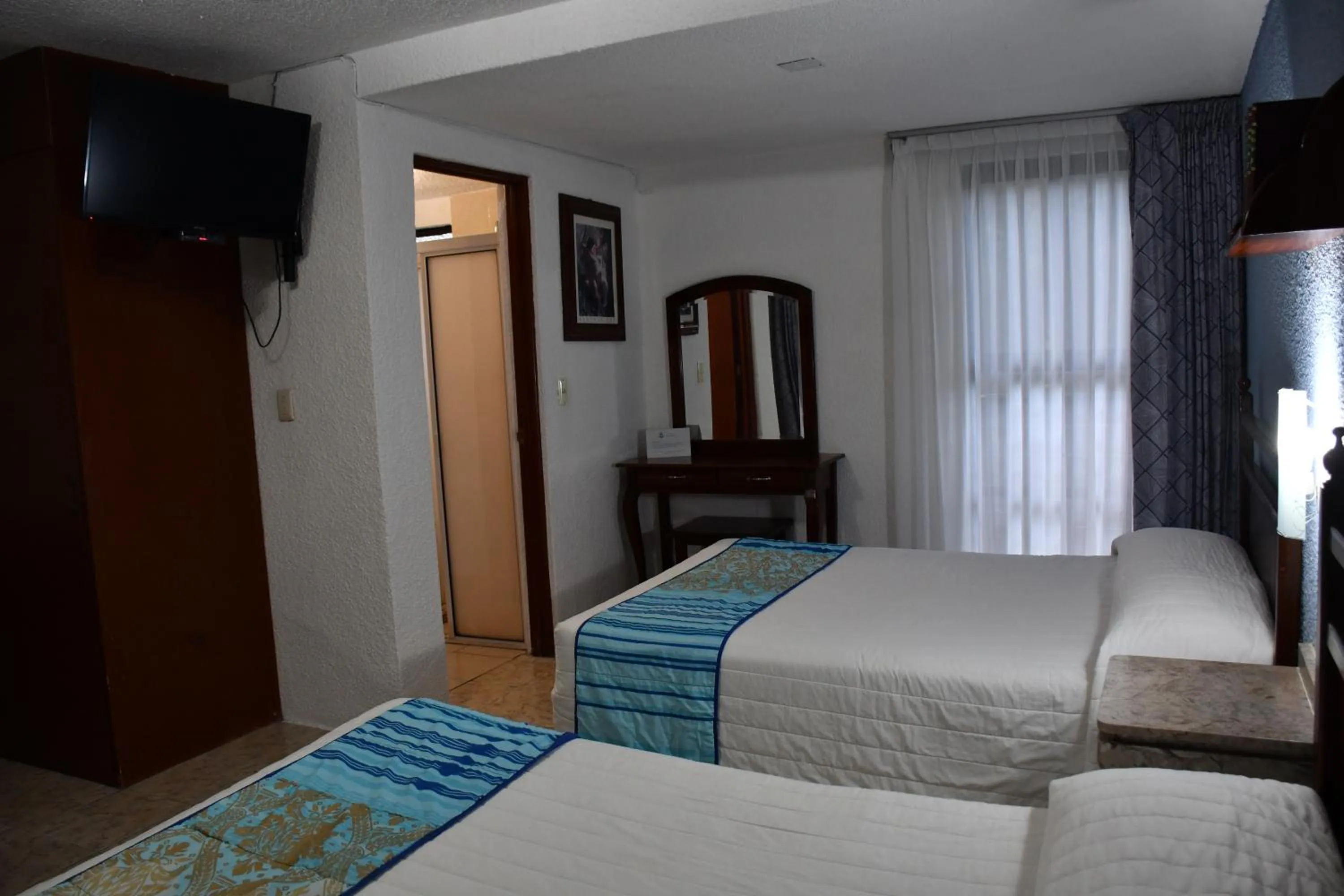 Bed in Hotel Posada Santa Fe