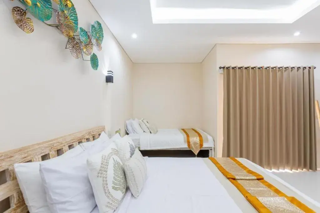 Triple Room in Kubu Ramah Canggu Triple Room in Kubu Ramah Canggu