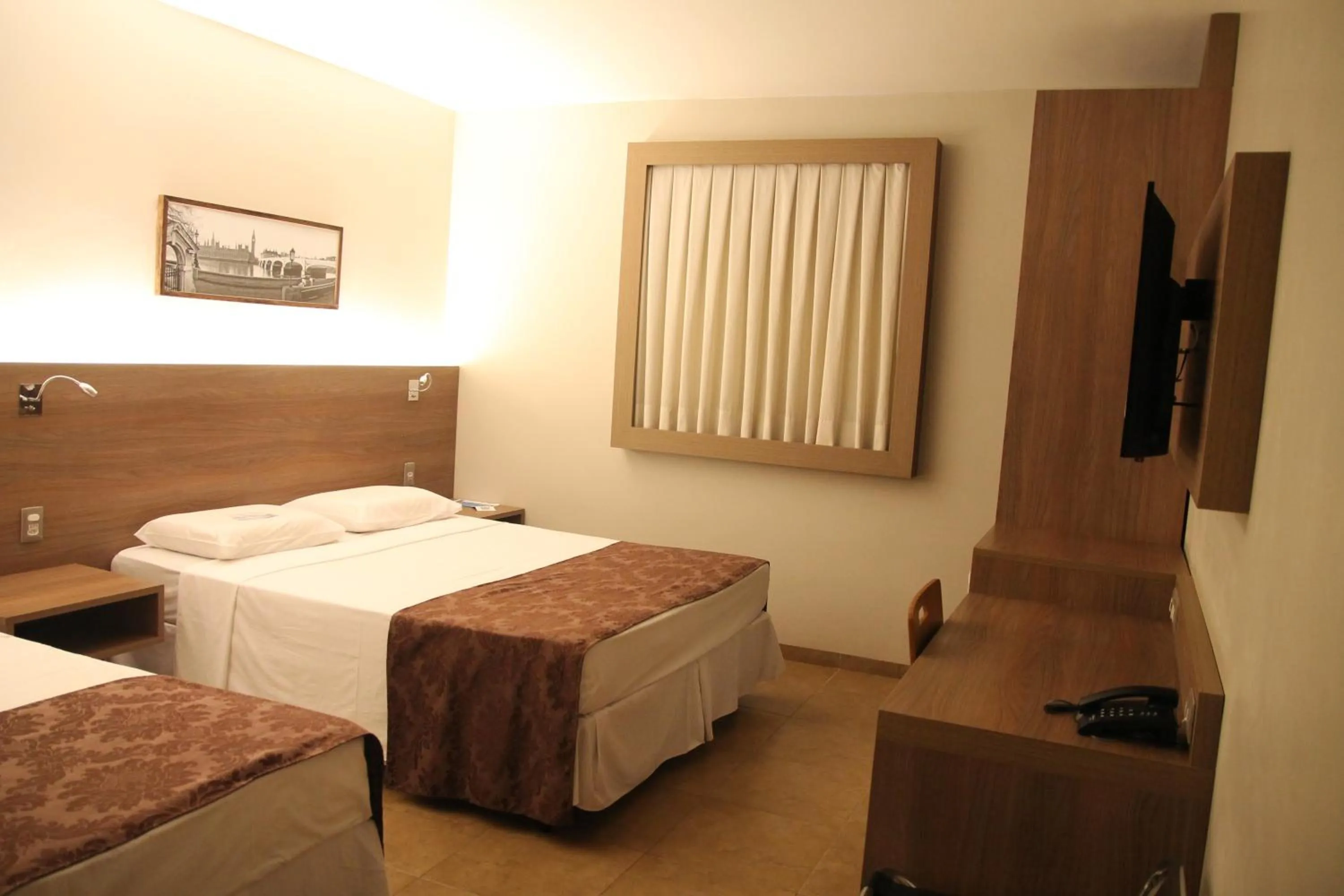 Bed in Orion Inn Hotel