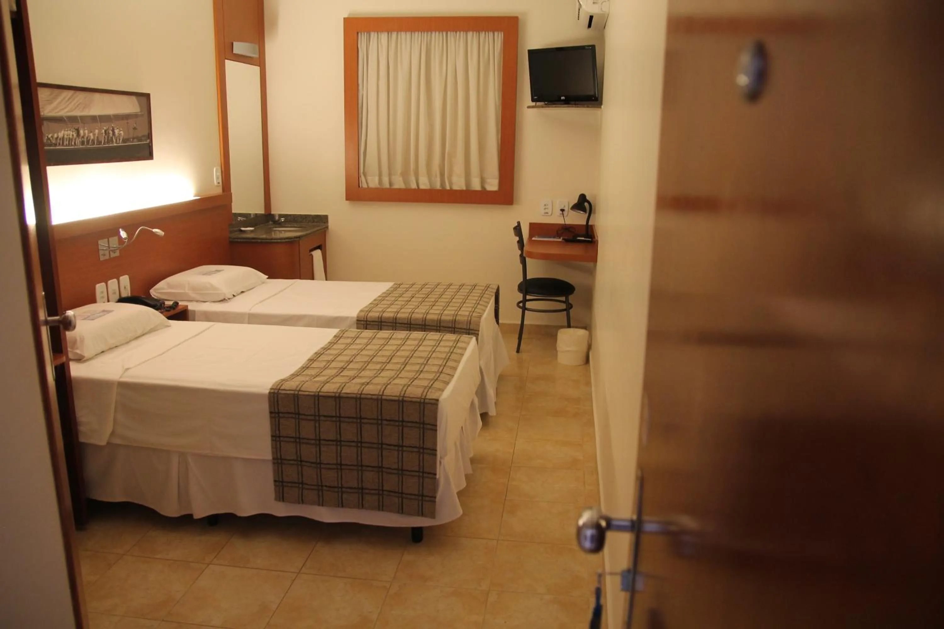 Photo of the whole room, Bed in Orion Inn Hotel