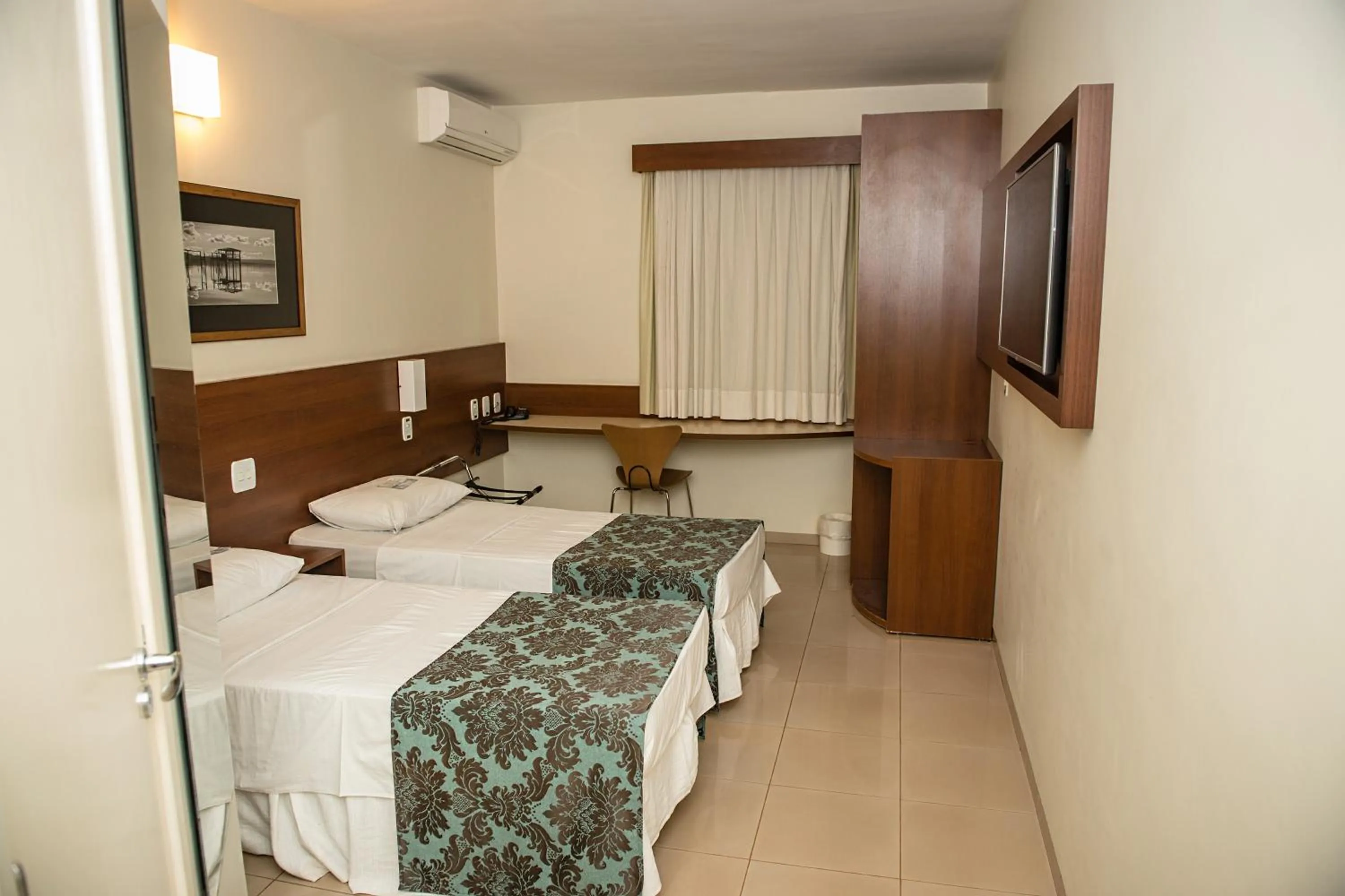 Bed in Orion Inn Hotel