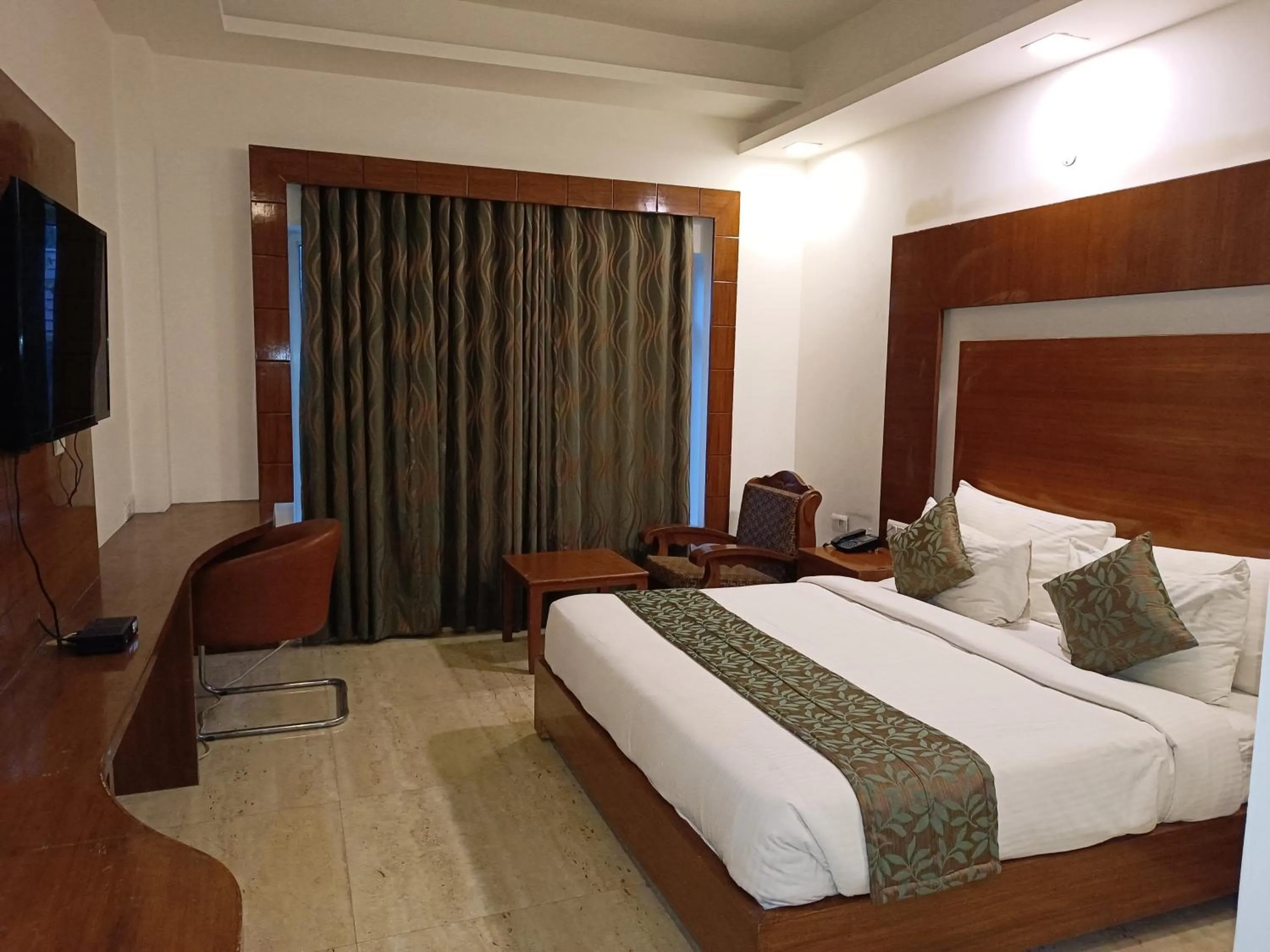 Bed in The Grand Aurra Resorts