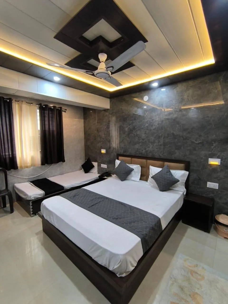 Bed in Hotel Goyal Palace