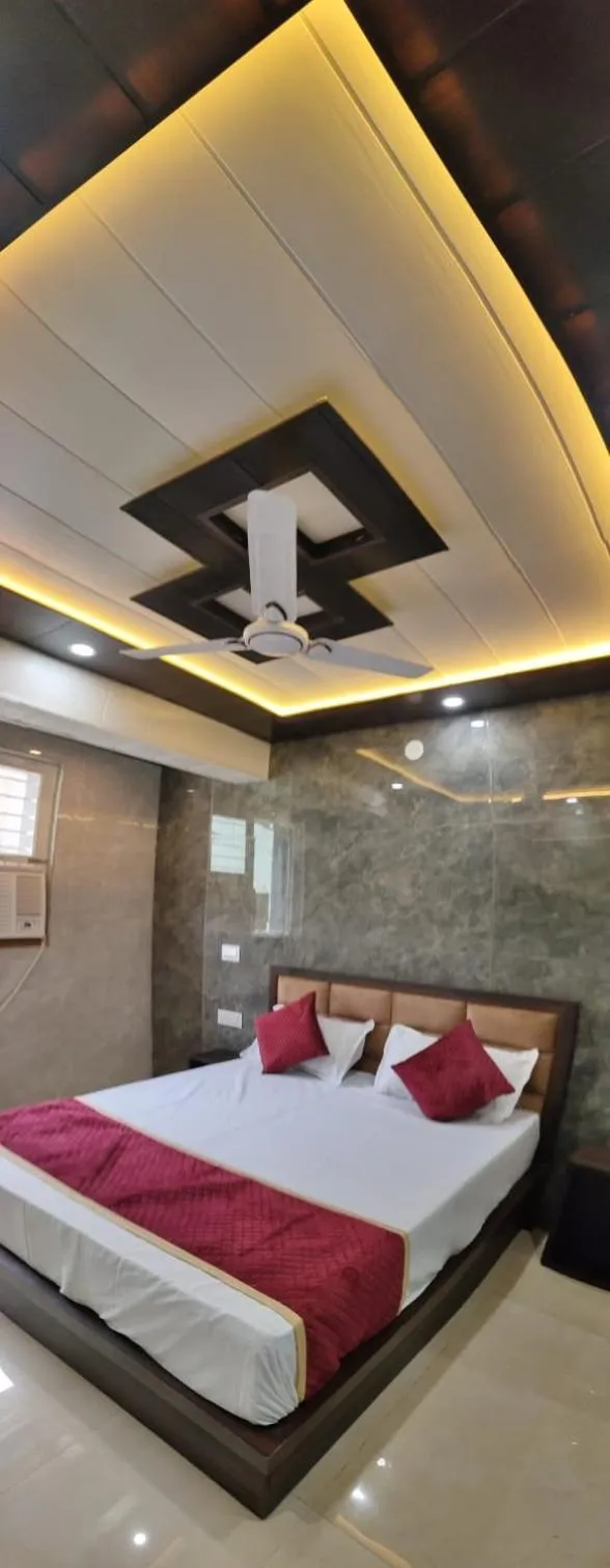 Bed in Hotel Goyal Palace