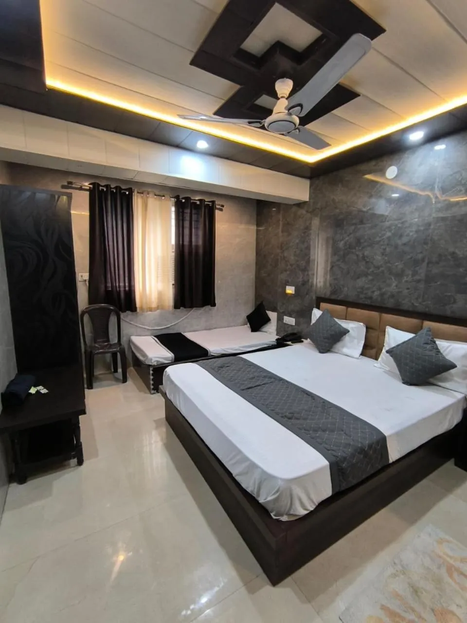 Bed in Hotel Goyal Palace