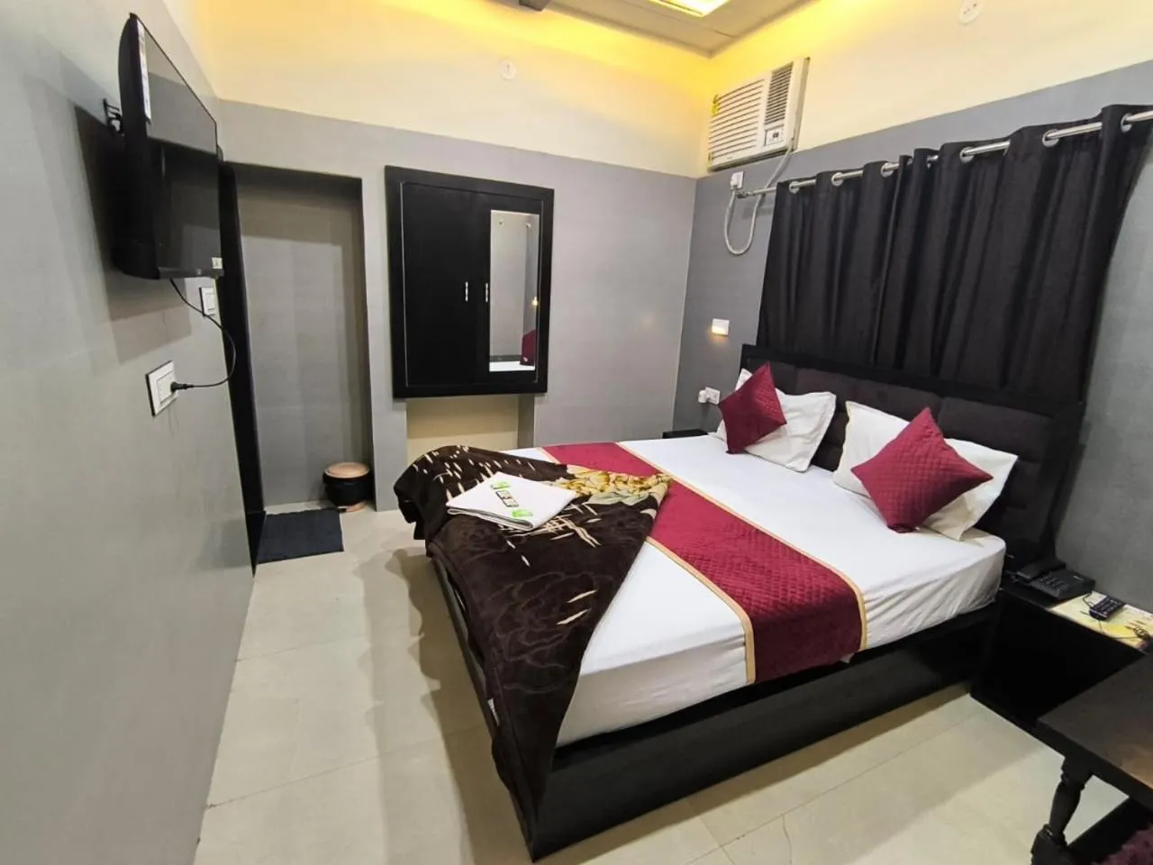 Bed in Hotel Goyal Palace