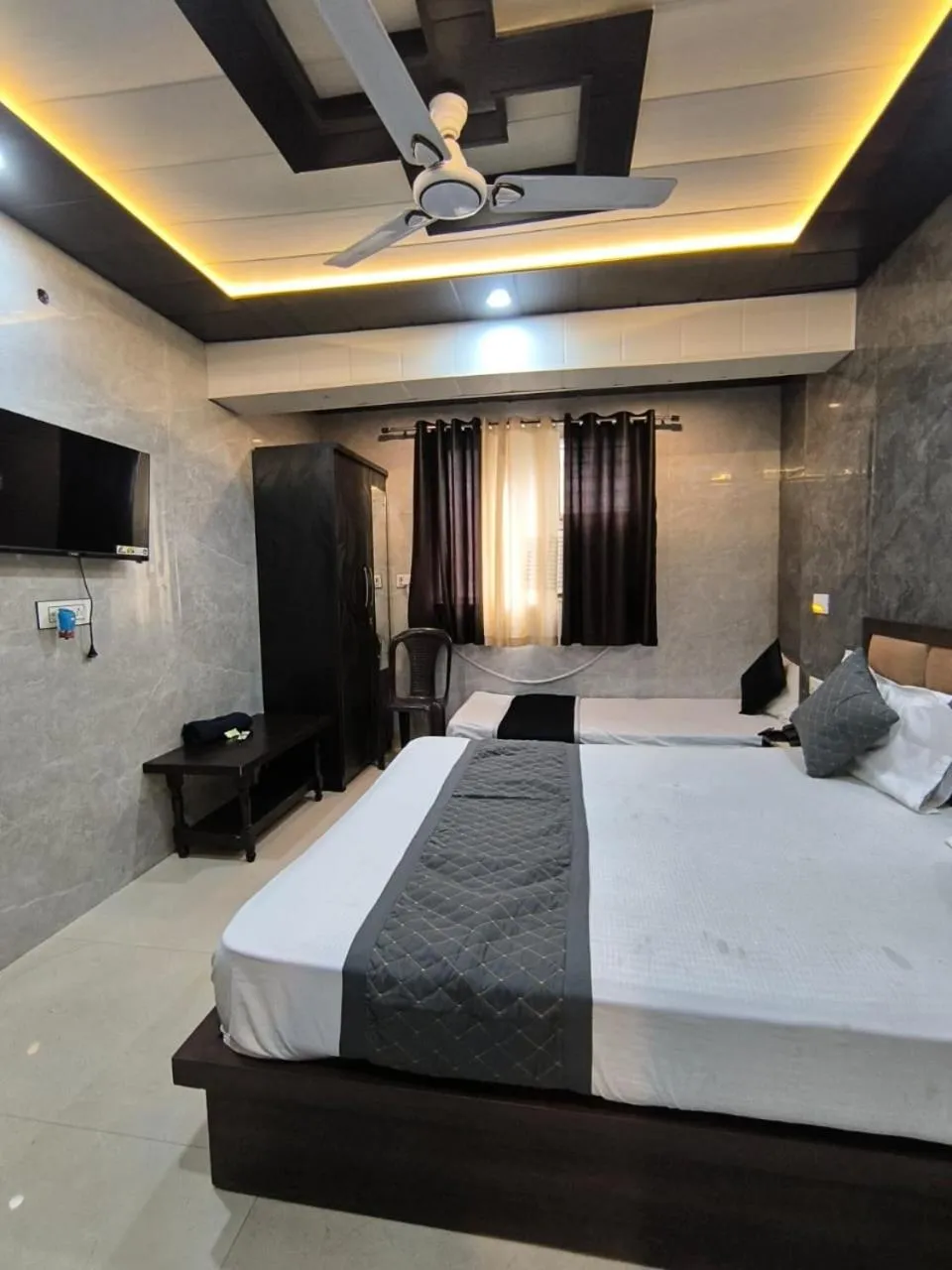 Bed in Hotel Goyal Palace