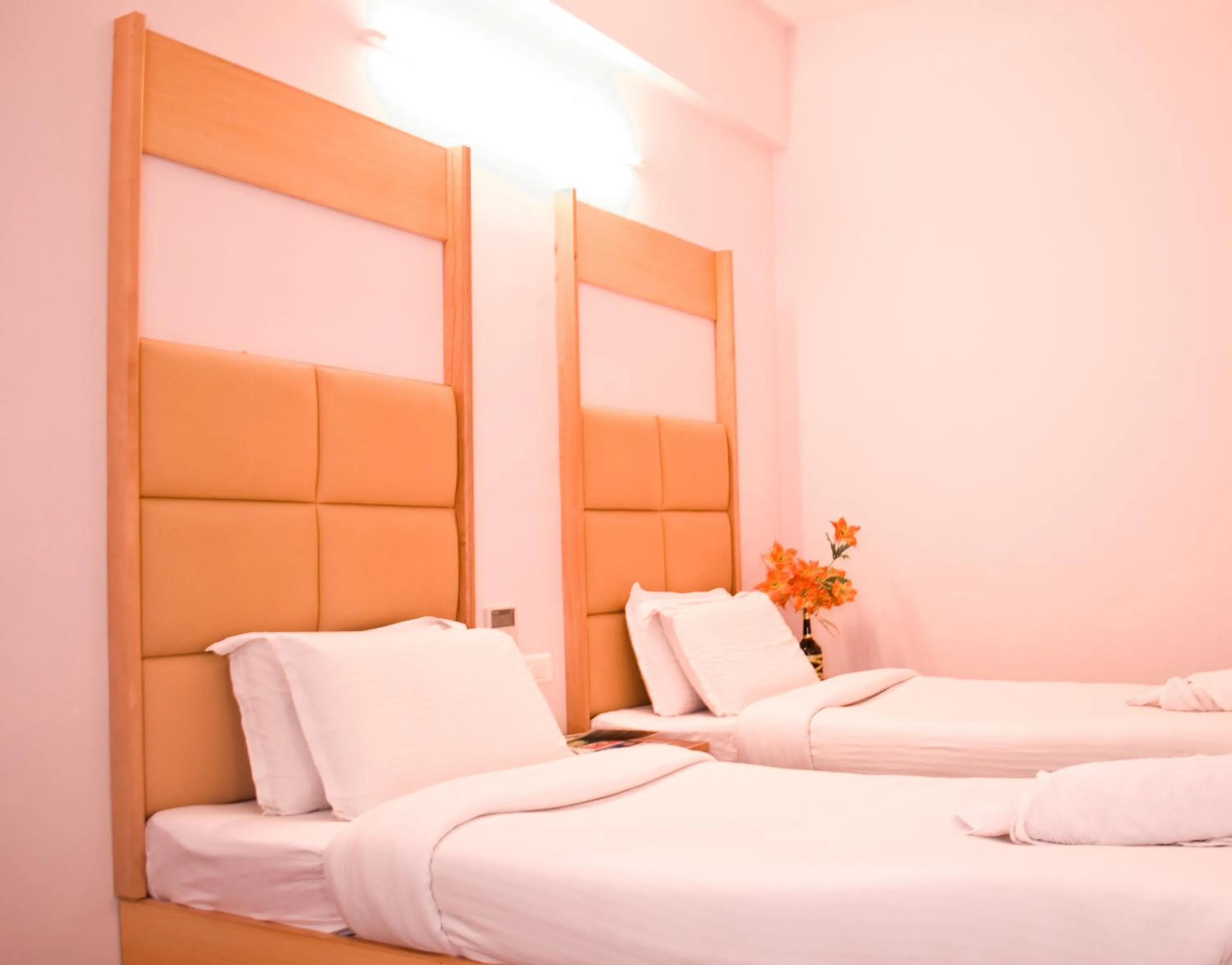 Bed in Hotel Rajadhane Madurai