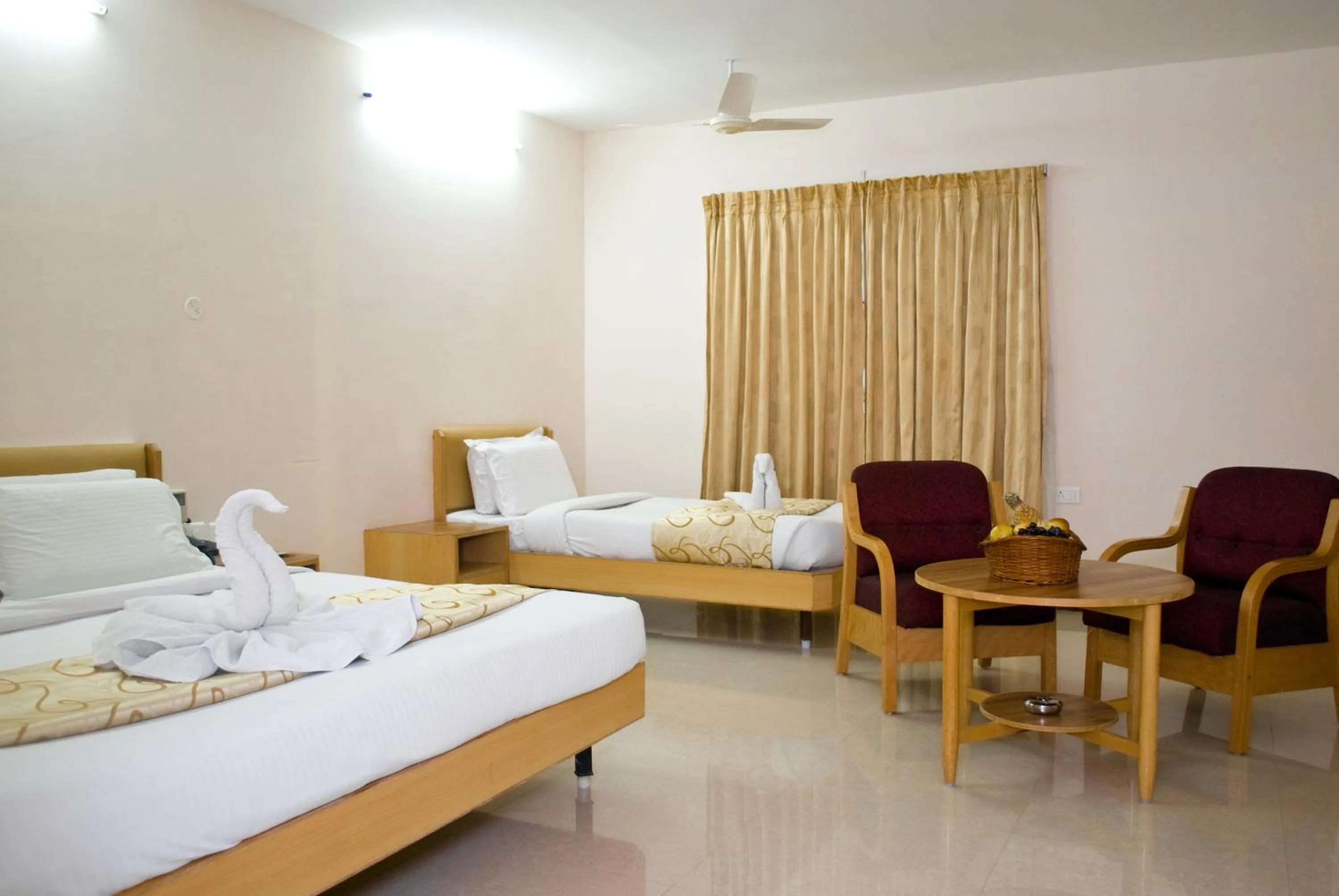 Bed in Hotel Rajadhane Madurai