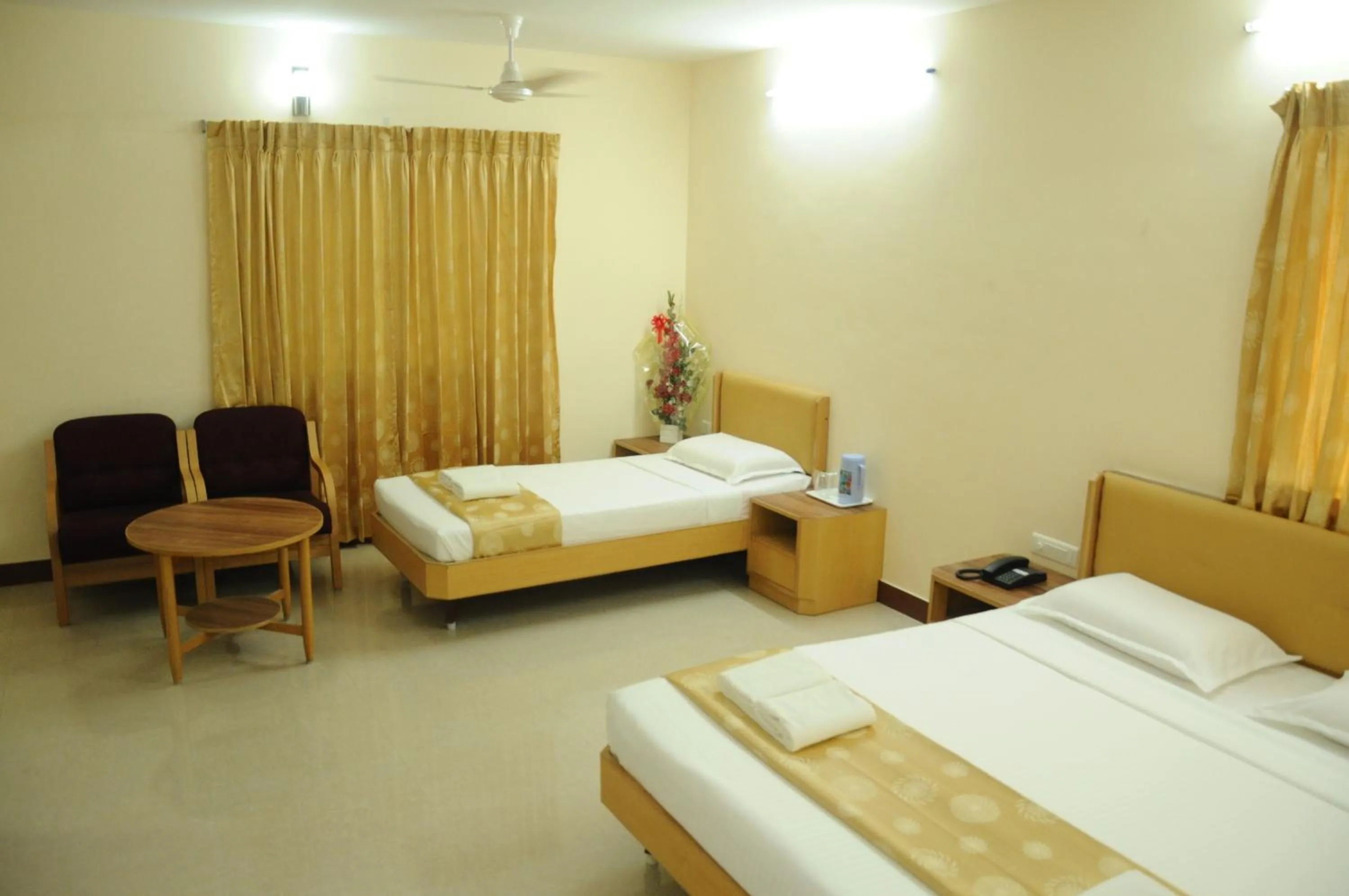 Bed in Hotel Rajadhane Madurai