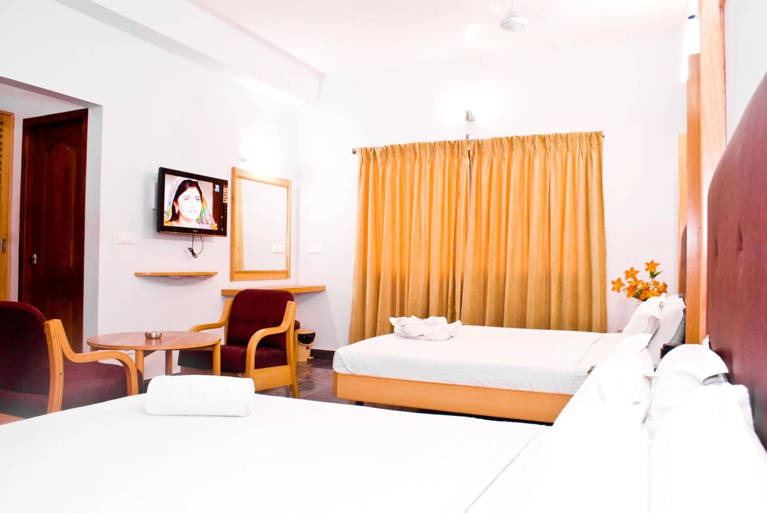 Bed in Hotel Rajadhane Madurai