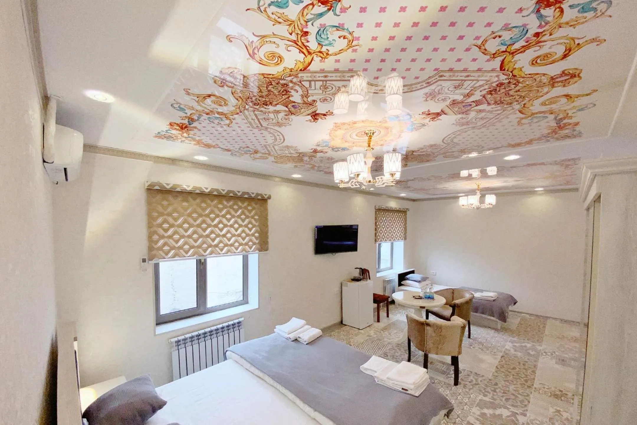 Communal lounge/ TV room, Bed in NANOSH EAST HOTEL