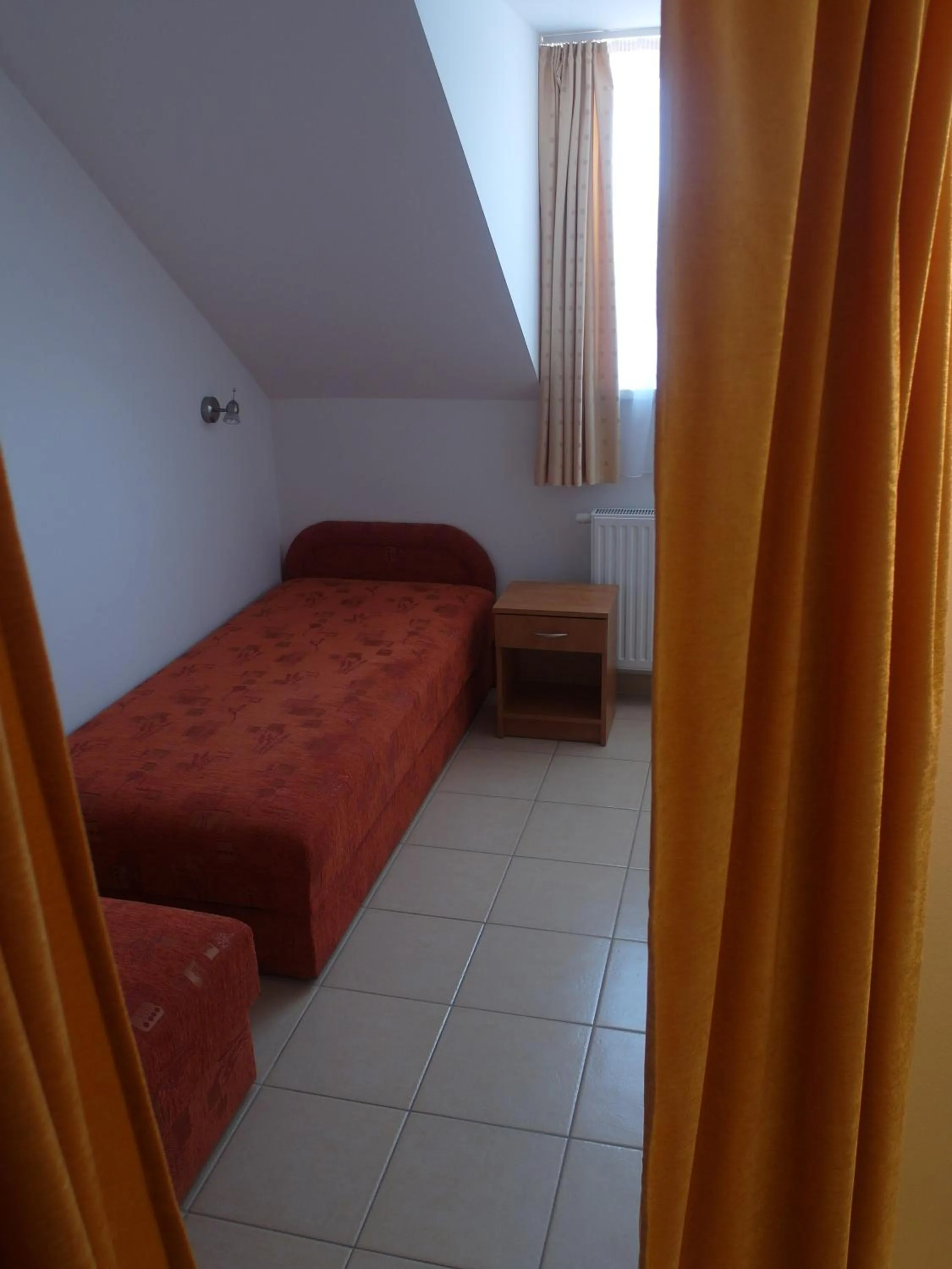 Bed in Tip-Top Apartmenthouse