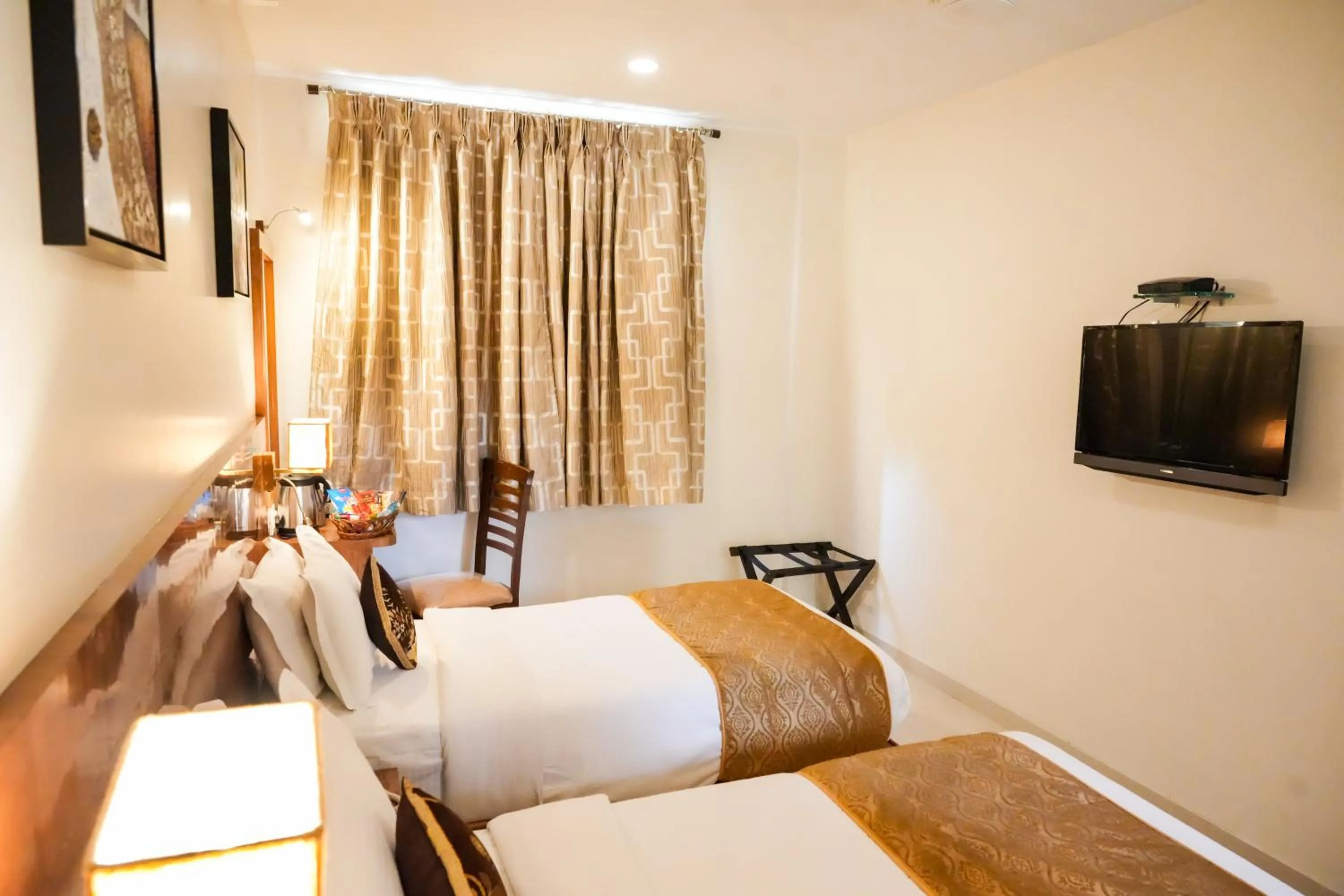 Bedroom, Bed in Hotel Sai Jashan Shirdi - Where blessings & comfort meet