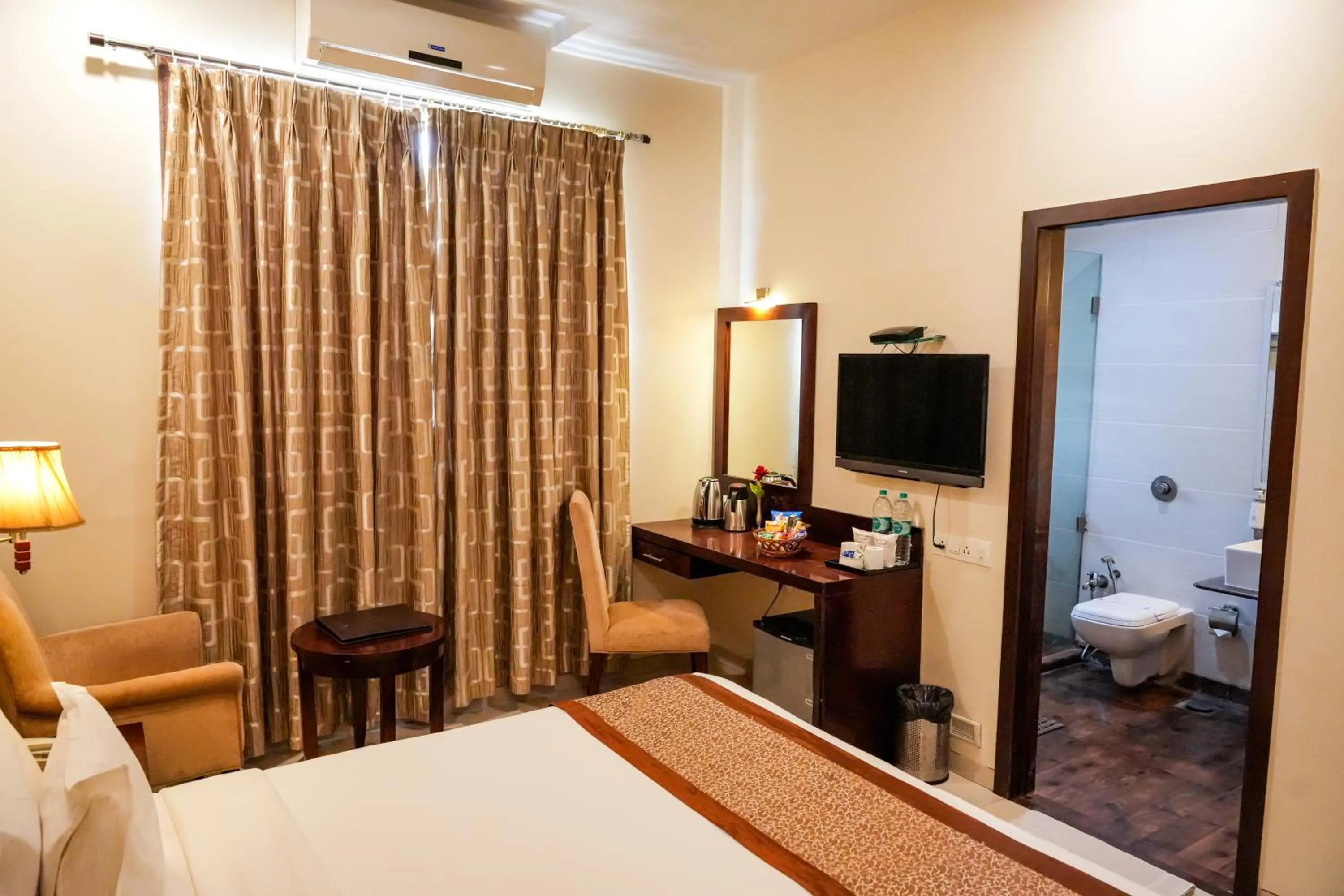 TV and multimedia, Bed in Hotel Sai Jashan Shirdi - Where blessings & comfort meet